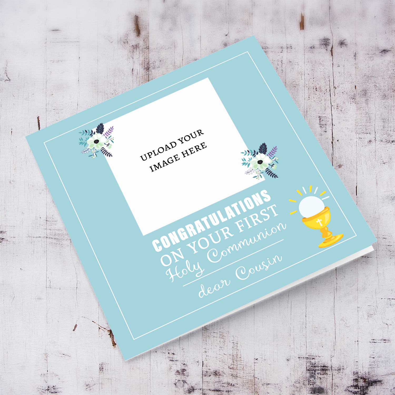 A dainty First Holy Communion photo card for Cousin , in a blue toned background with dainty florals in English