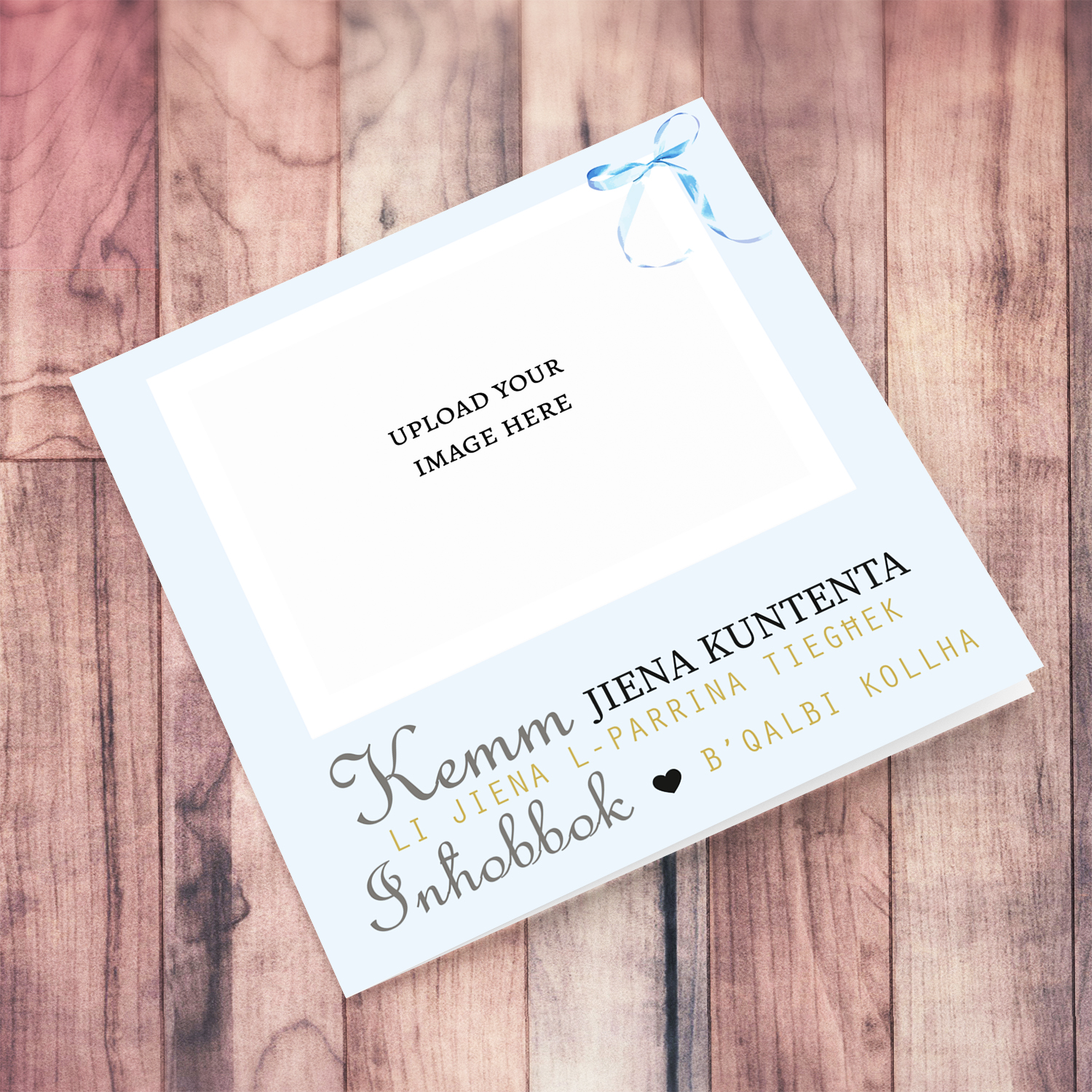 So happy to be your Godmother photo baptism card for boys in light blue background featuring a cute petite blue bow in Maltese