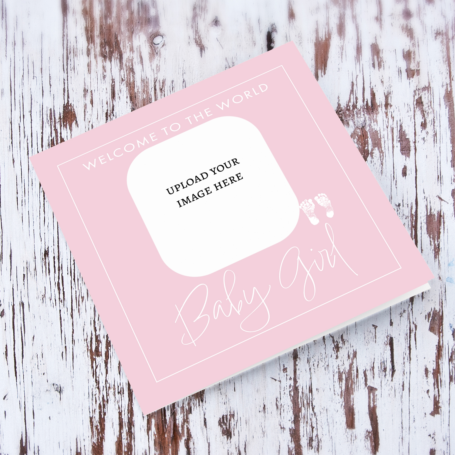 A new born baby photo card with a light pink background and white text in English