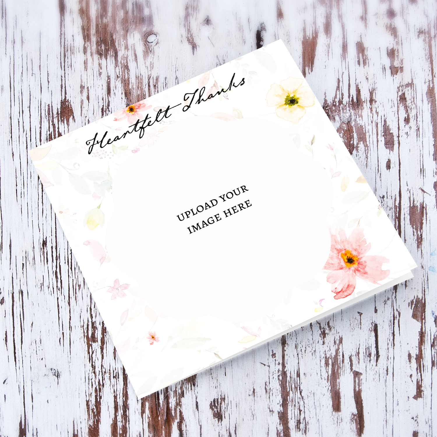 A delicate floral background photo thank you card with a blank message inside 