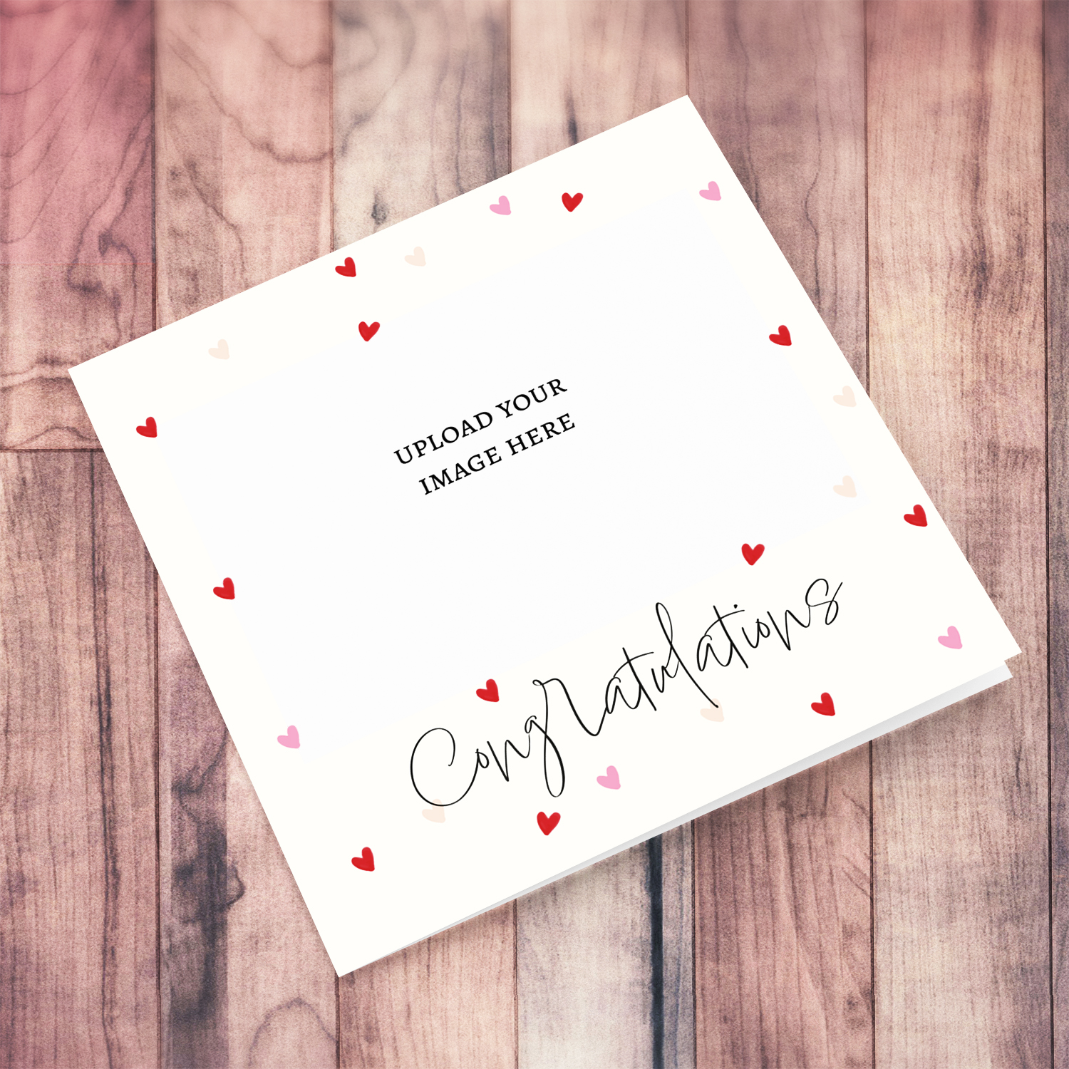 A cream coloured open photo card with scattered red and pink hearts in English (Blank Message)