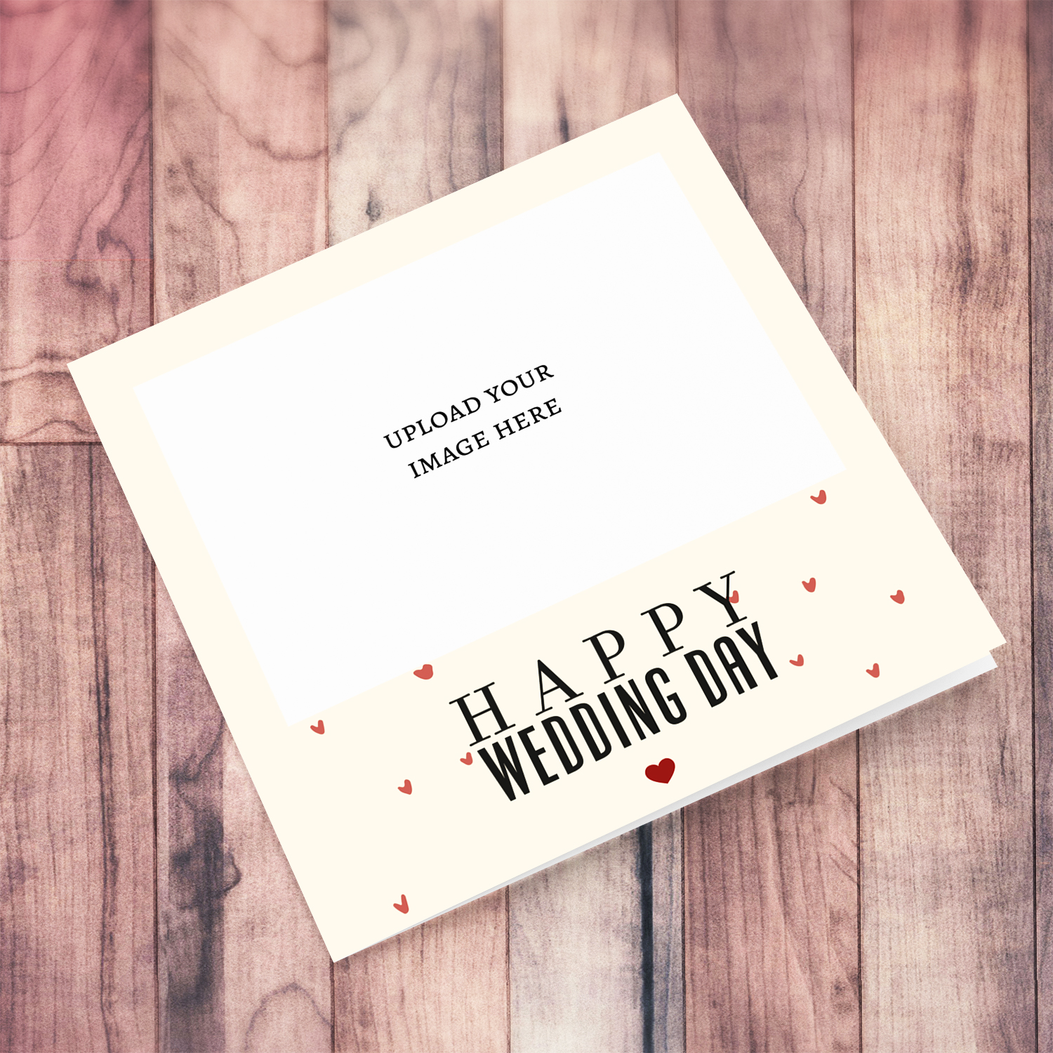 A photo wedding card in a cream background with scattered hearts in English