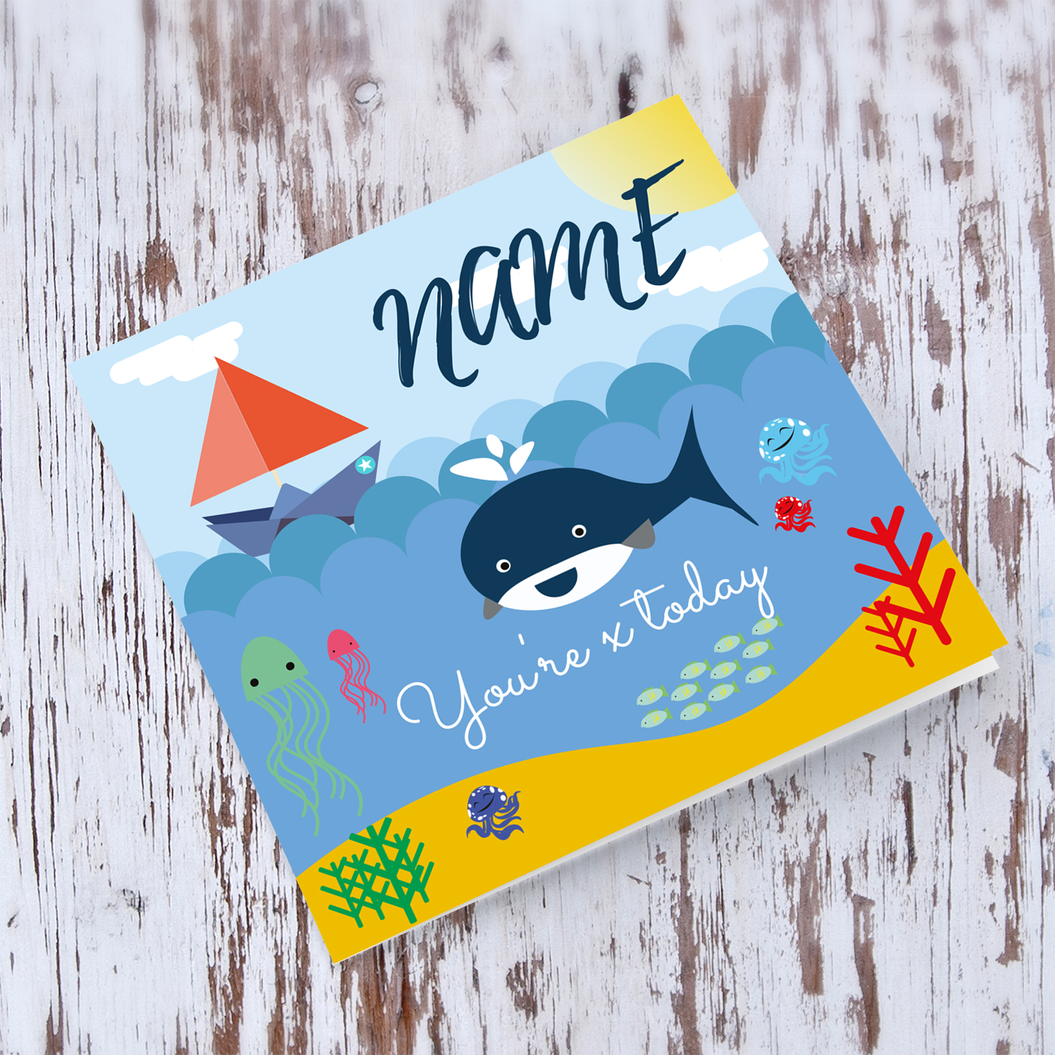Underwater sea themed birthday card with whale, jellyfish, fish, octopus and sailing boat in English