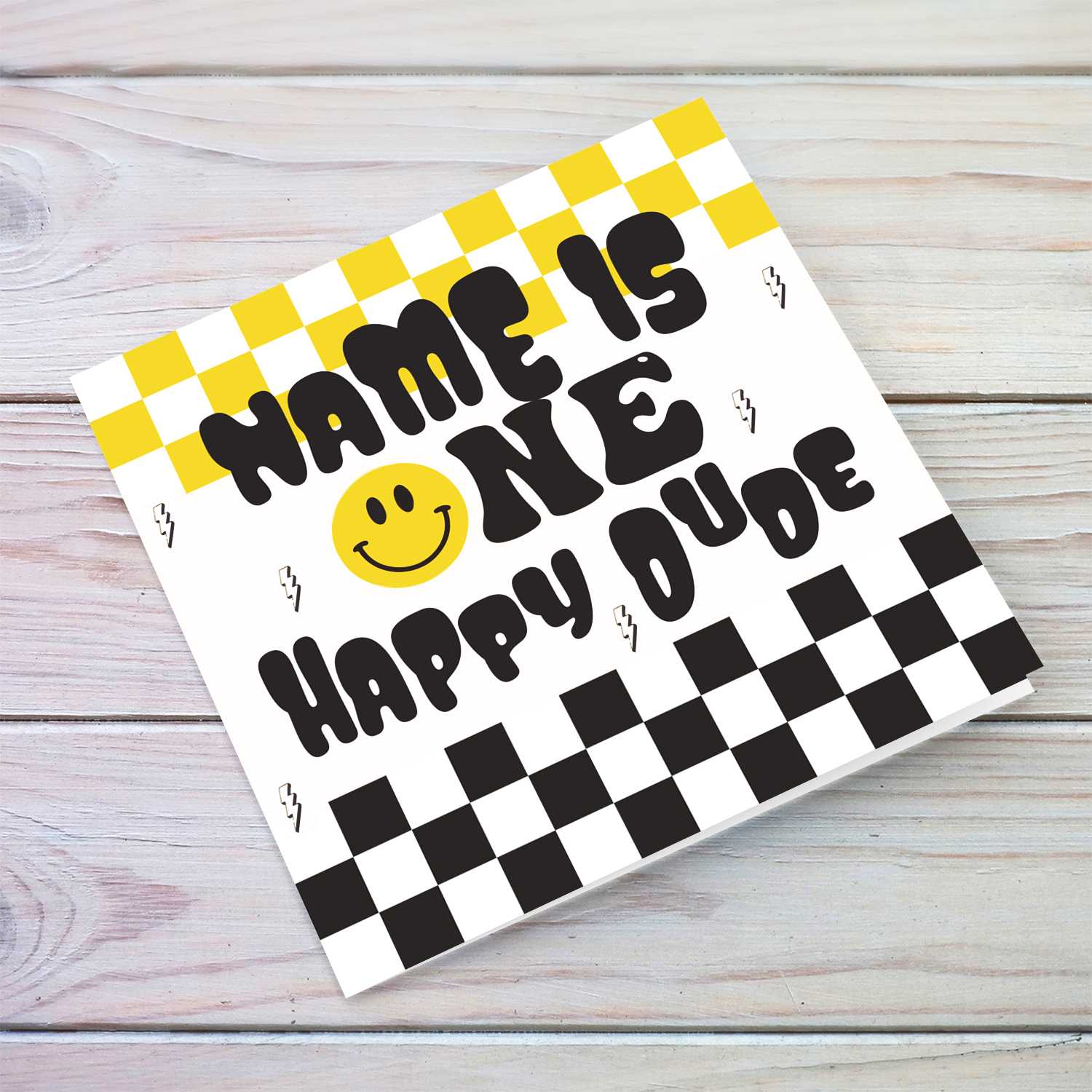 First birthday card for ONE HAPPY DUDE with smiley and yellow and black chequered pattern in English