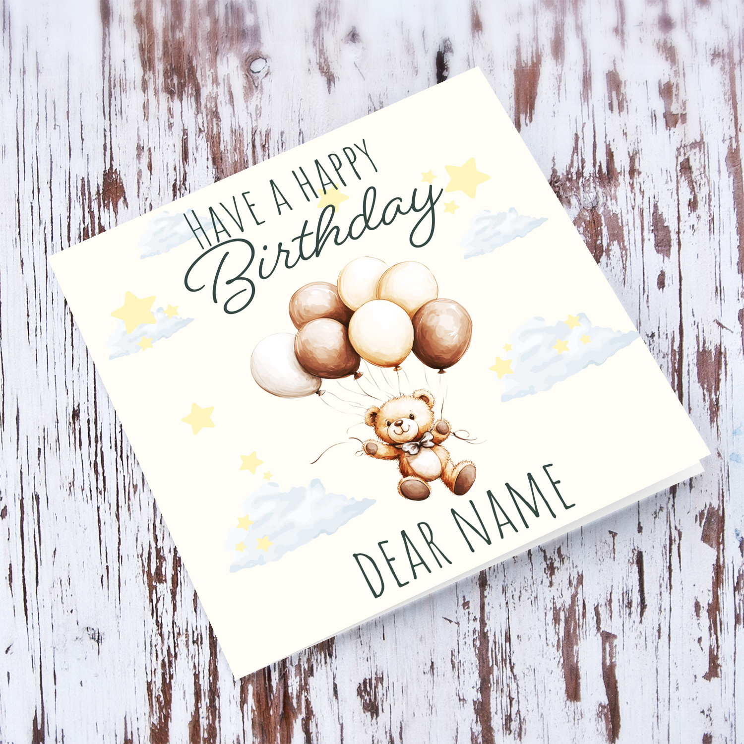 A cute unisex bear themed birthday card in neutral colours in English