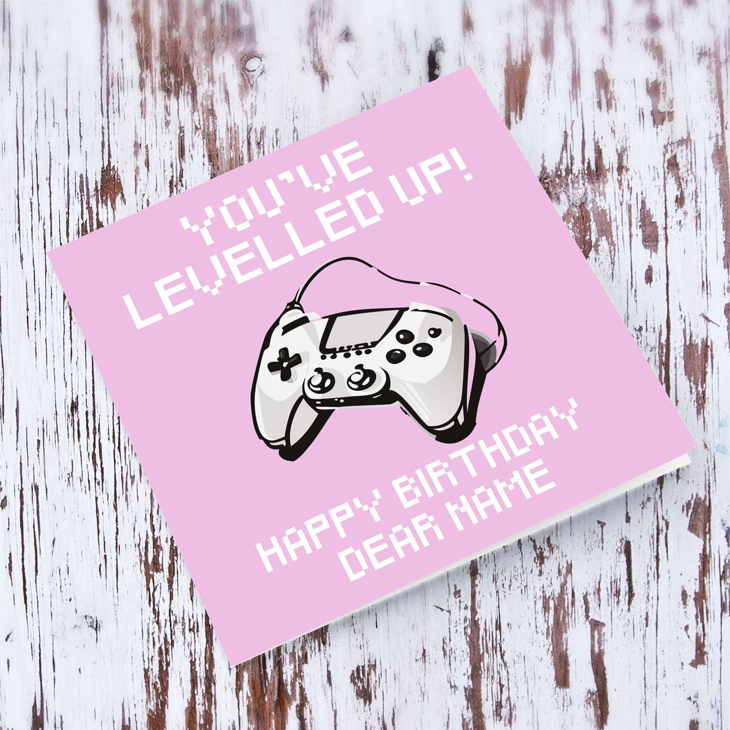 Game console in pixellated text, pink background birthday card in English (Personalisable)