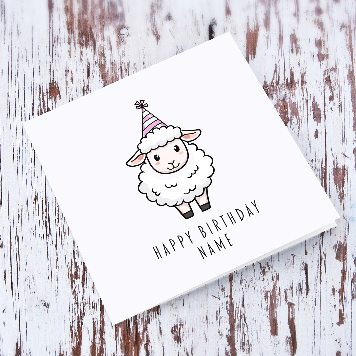 A cute sheep wearing a striped white and light pink party hat birthday card in English (Personalisable)