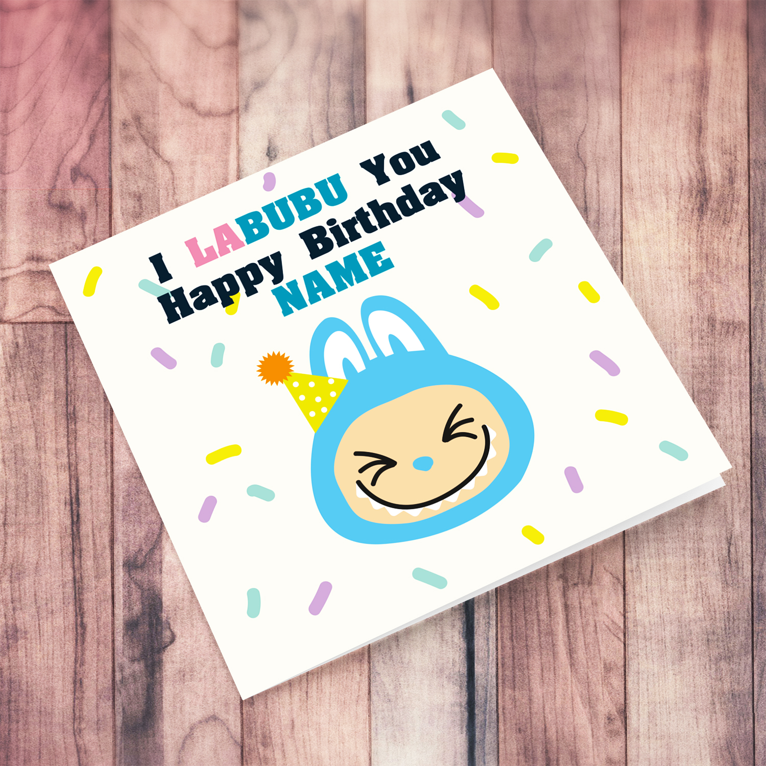 Blue labubu themed birthday card featuring a blue labubu wearing a party hat, and scattered colourful confetti - I labubu you - in English (Personalisable)