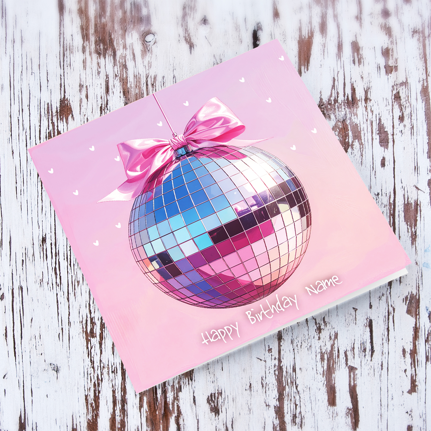 A cute disco ball themed birthday card, with a pink bow for First birthday in English (Personalisable)