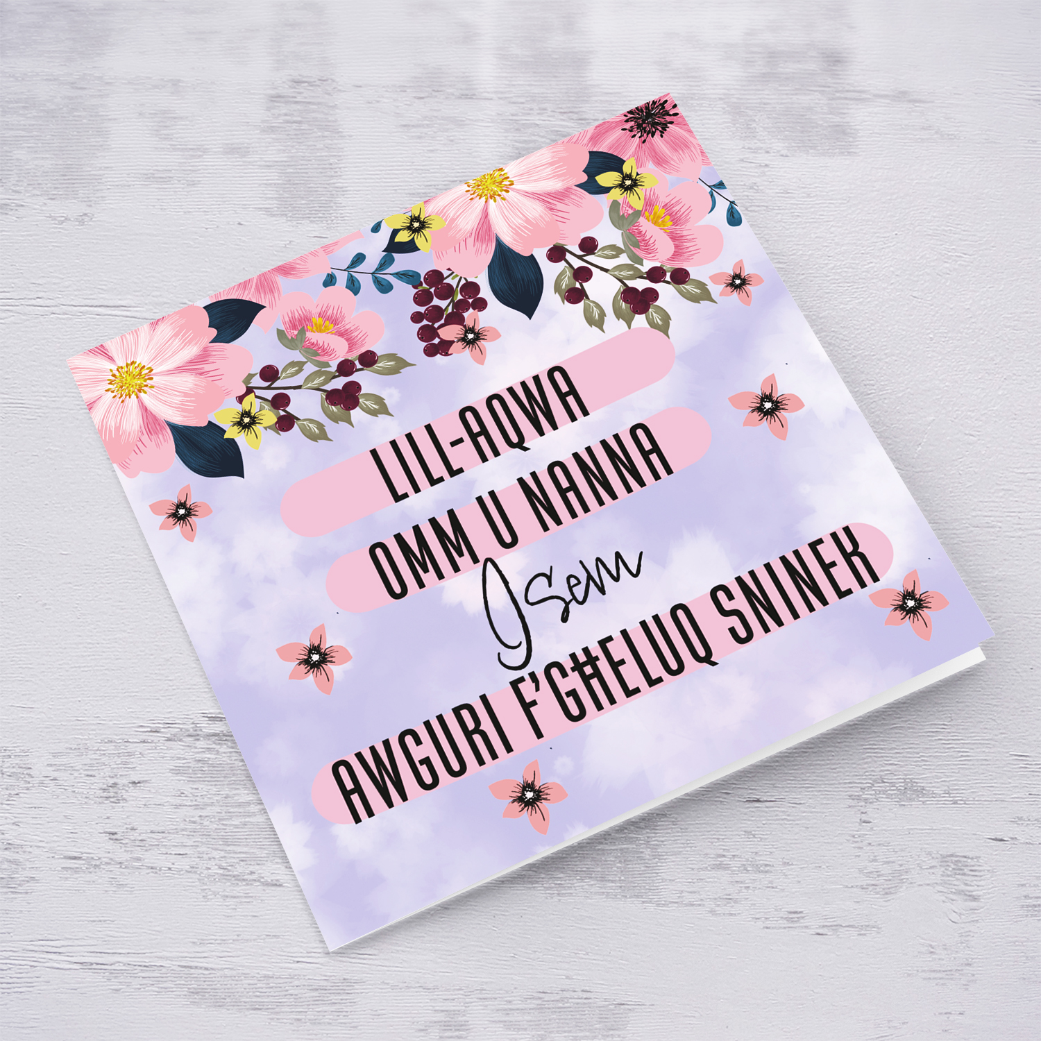 A birthday card for Mum & Grandma in a purple background with pink flowers in Maltese (Personalisable)