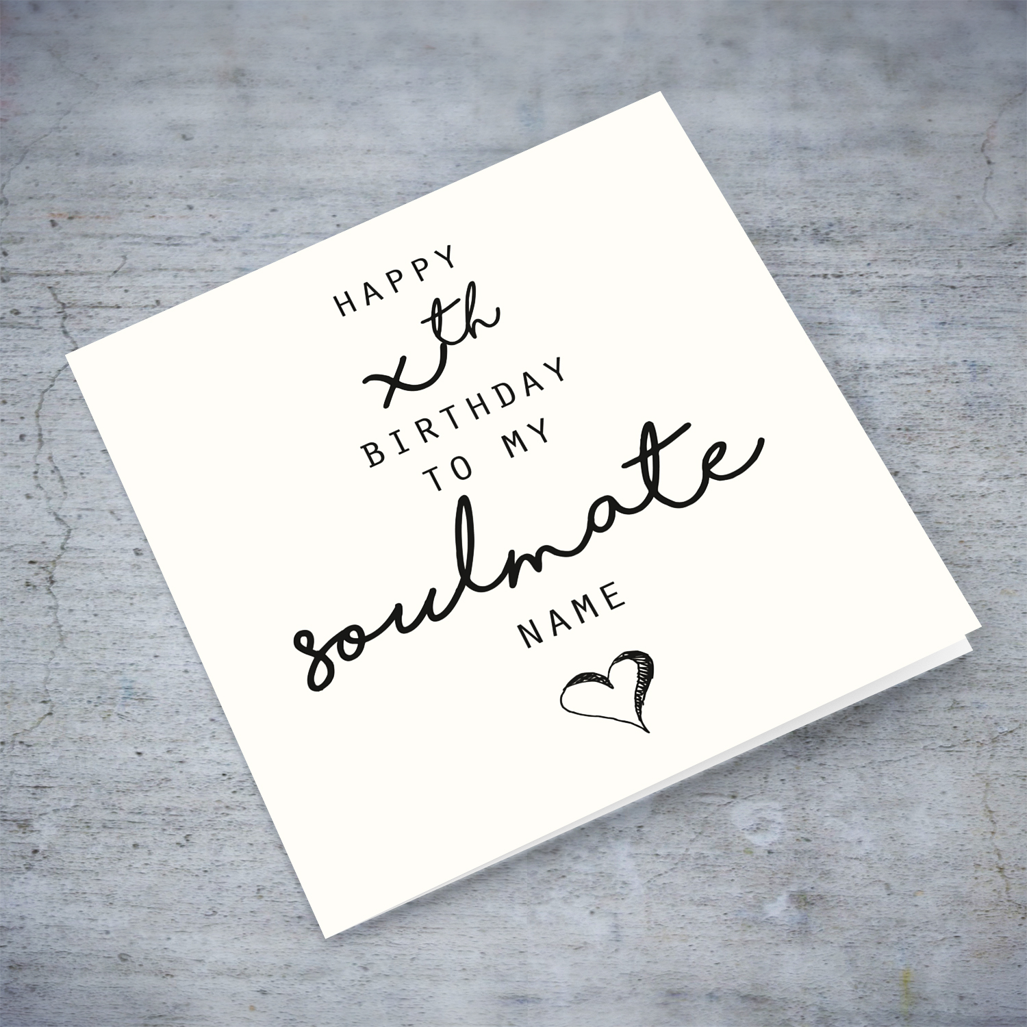 A minimalist birthday card - to my soulmate featuring a black heart in English (Personalisable)