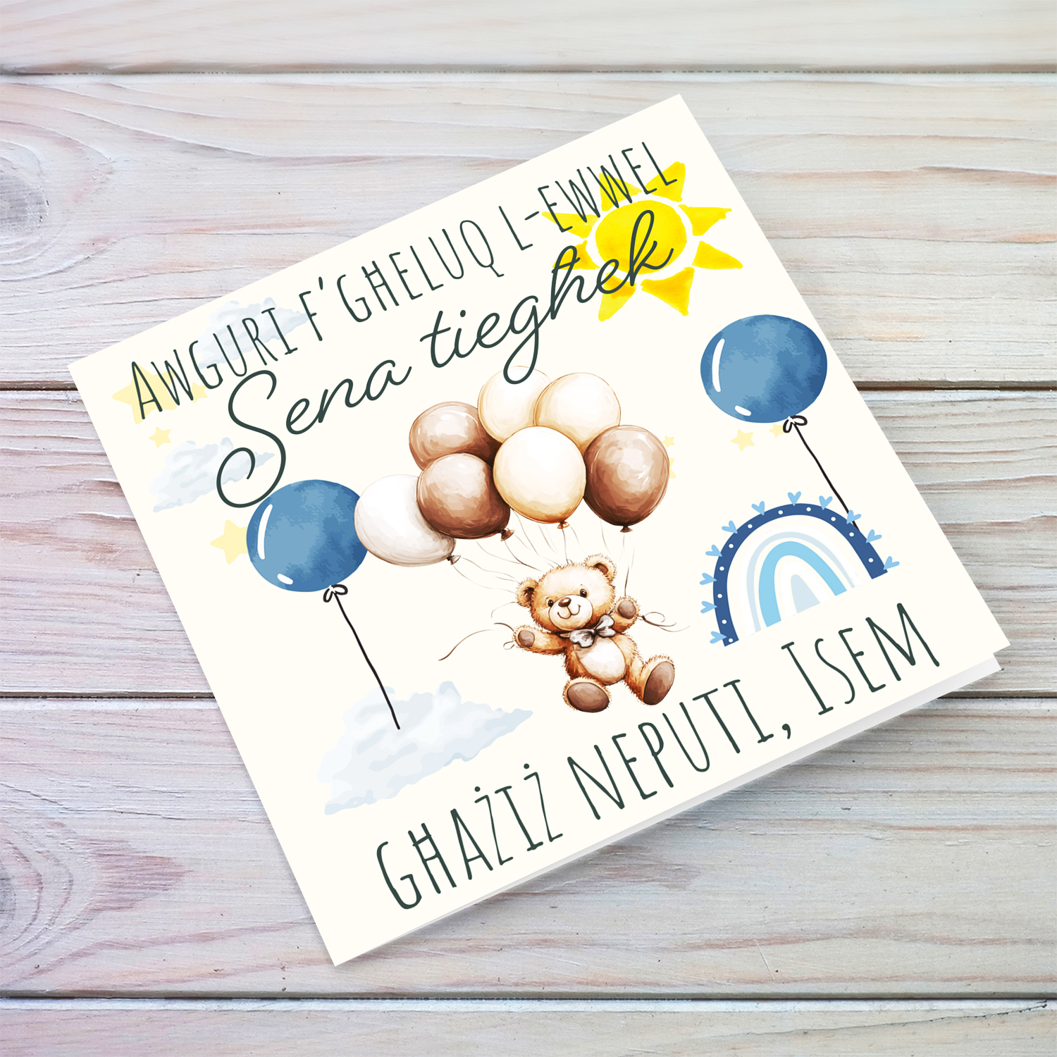 A cute first birthday card for nephew, featuring a bear floating, sun & rainbow in Maltese
