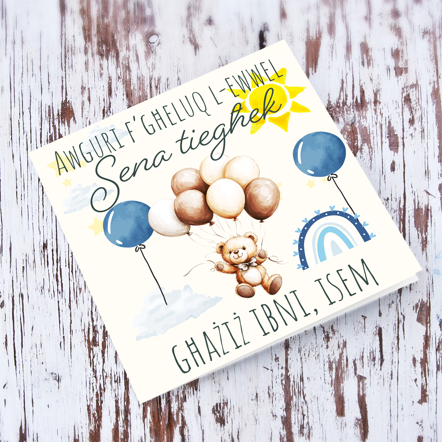 A cute first birthday card for son, featuring a bear floating, sun & rainbow in Maltese