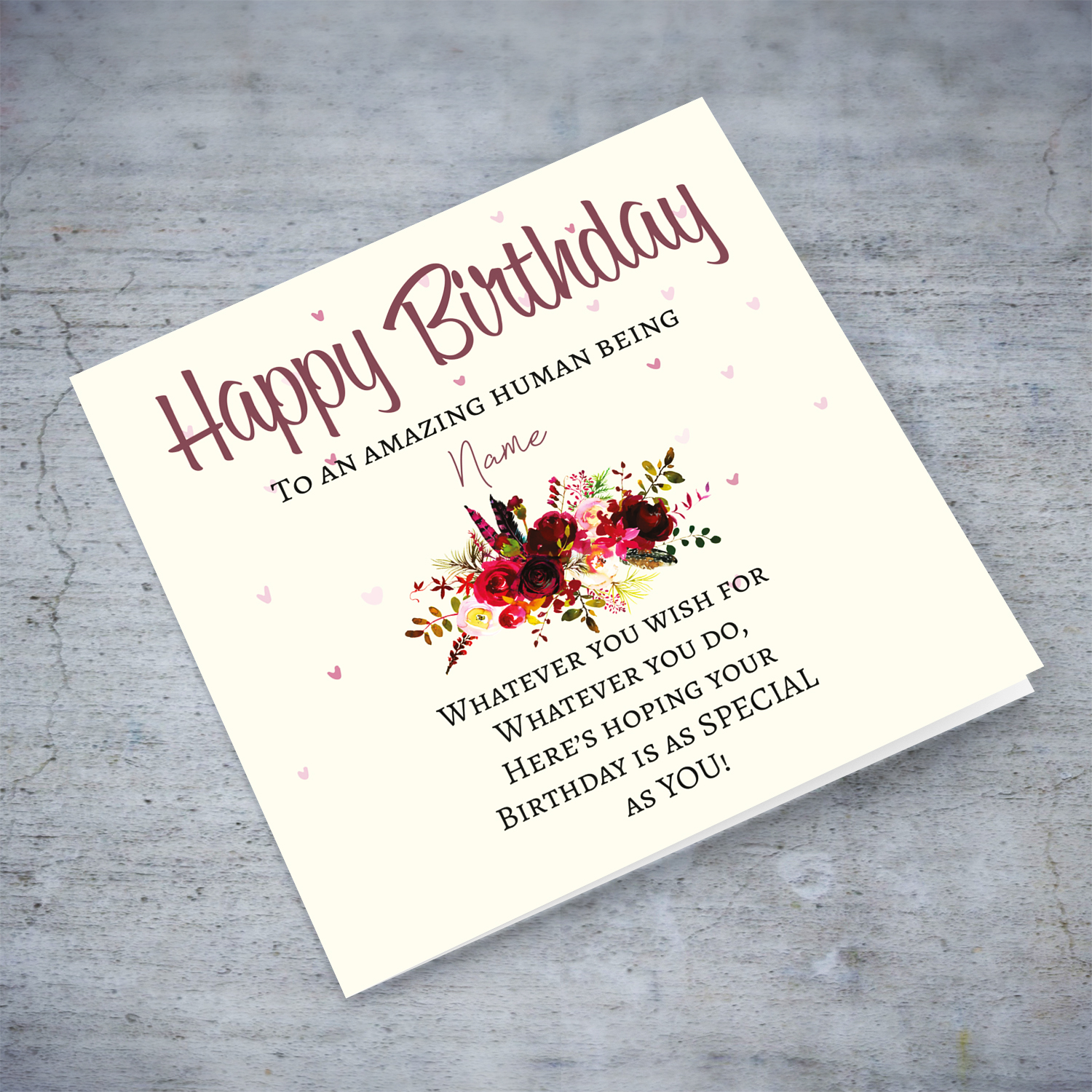 A birthday card with a special message with red tones colours and scattered hearts in English (Personalisable)
