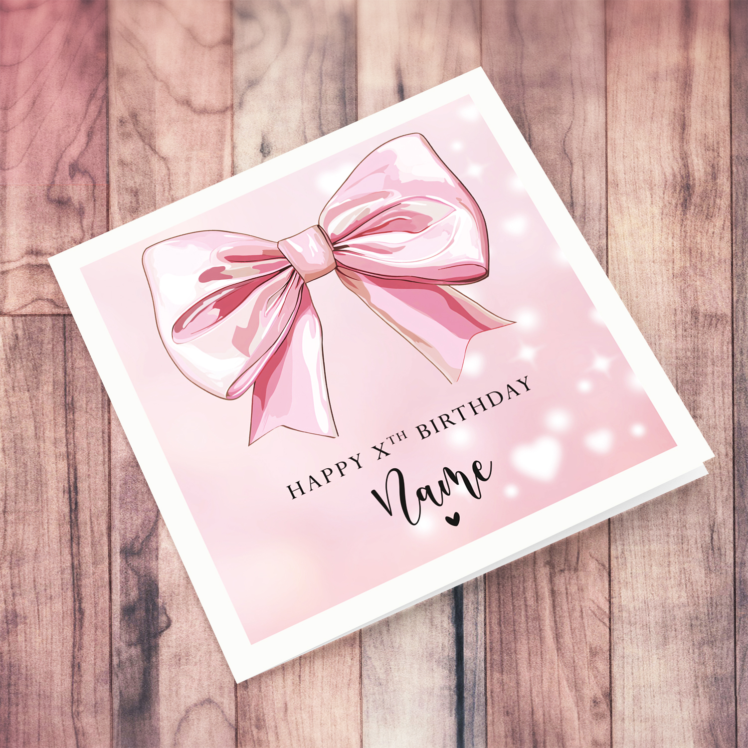 A cute birthday card with a big pink bow in English (Personalisable)