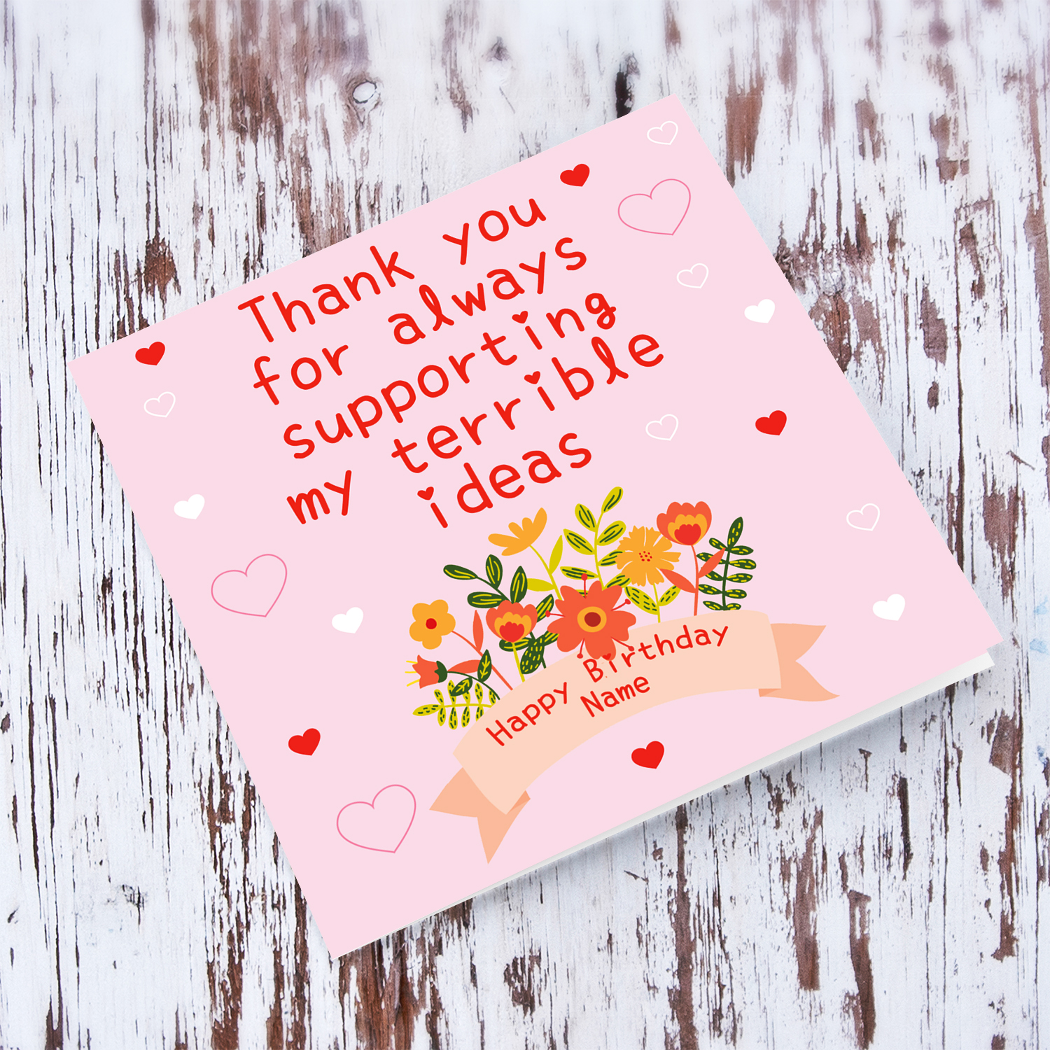 A cute and funny birthday card in a light pink background, scattered hearts and floral detail in English (Personalisable)