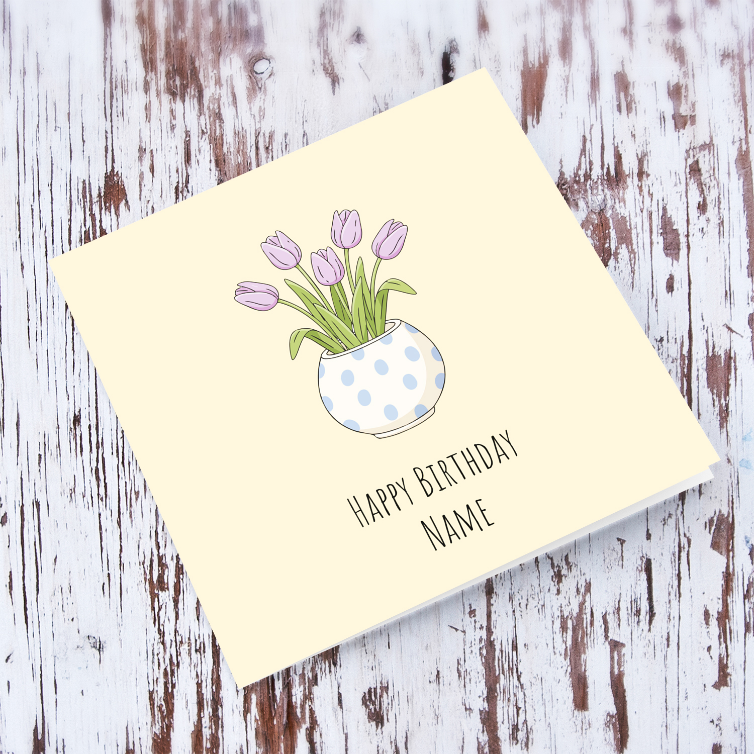 A beautiful birthday card featuring light purple tulips in spotted vase and neutral background in English (Personalisable)