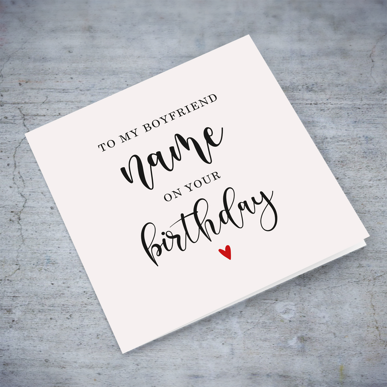 To my boyfriend on your Birthday greeting card in neutral background with red heart in English