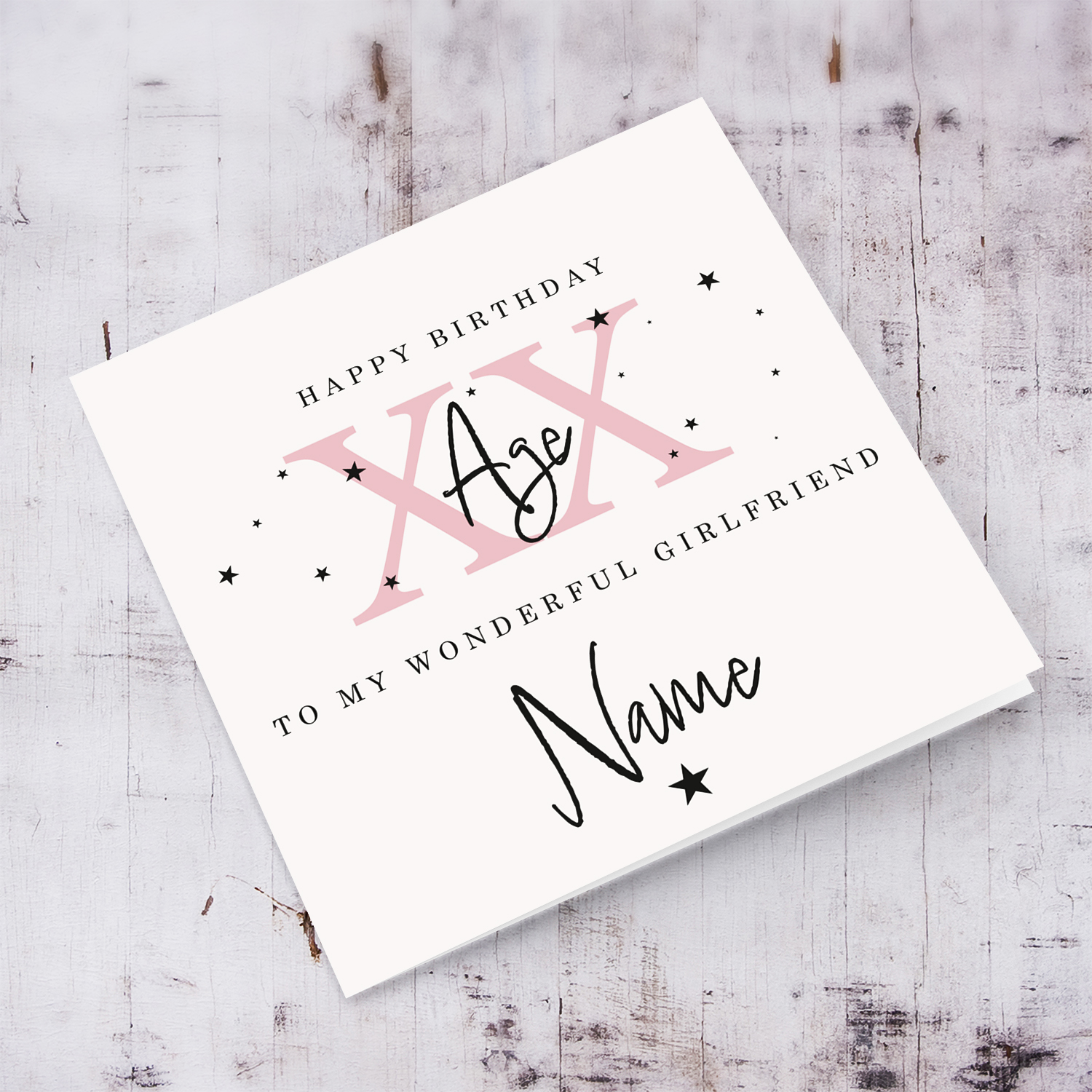 A beautiful birthday card for "my wonderful girlfriend" in a neutral background with scattered black stars, and age in pink - with personalisable Name & Age in English