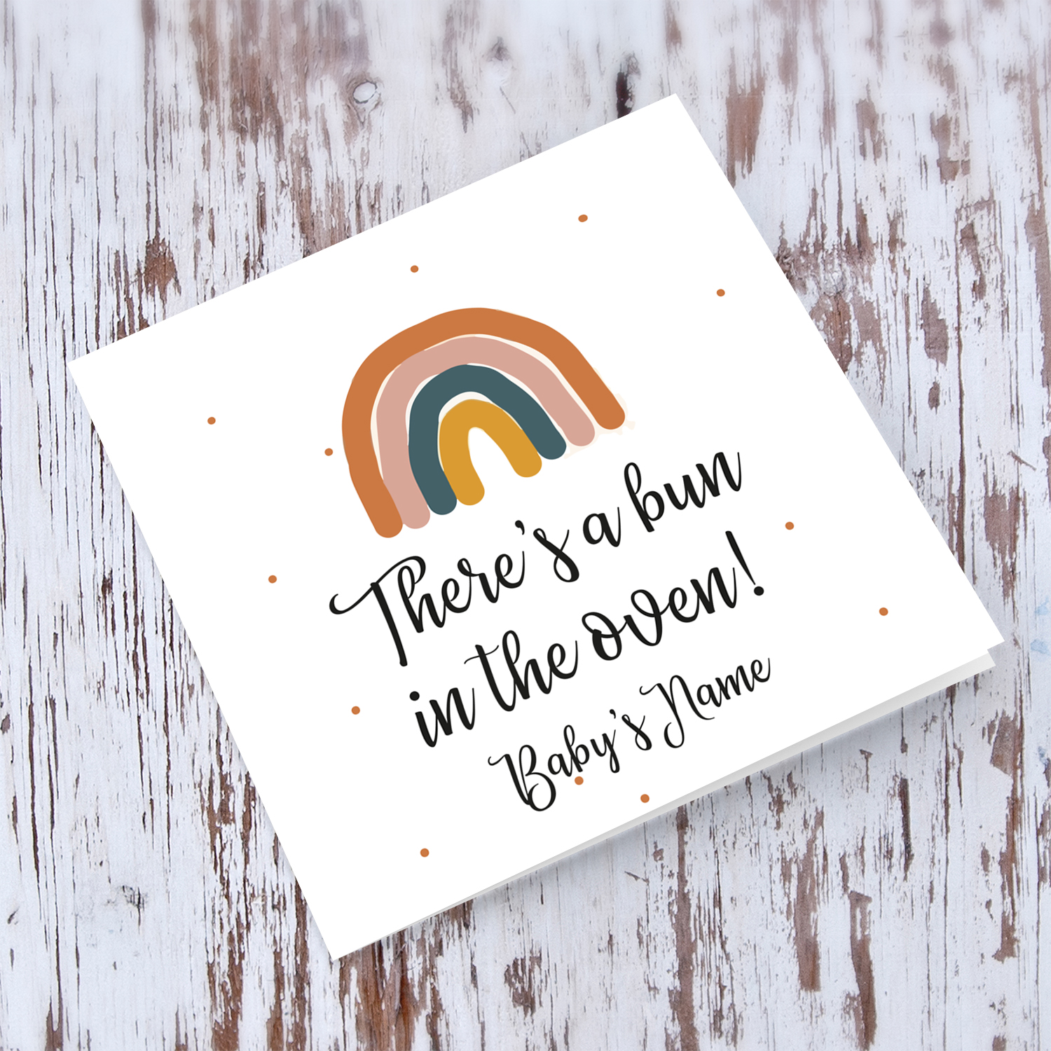 There's a bun in the oven rainbow themed baby shower card in English