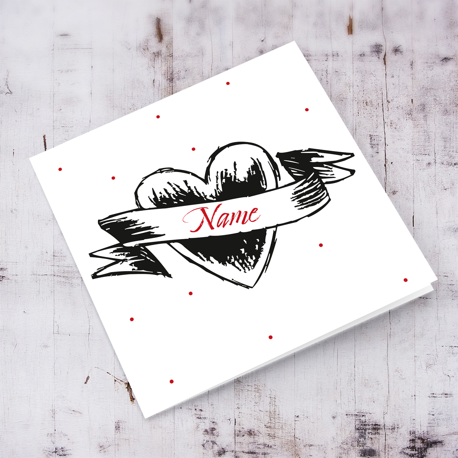 Black heart with banner open card with a blank message on the inside