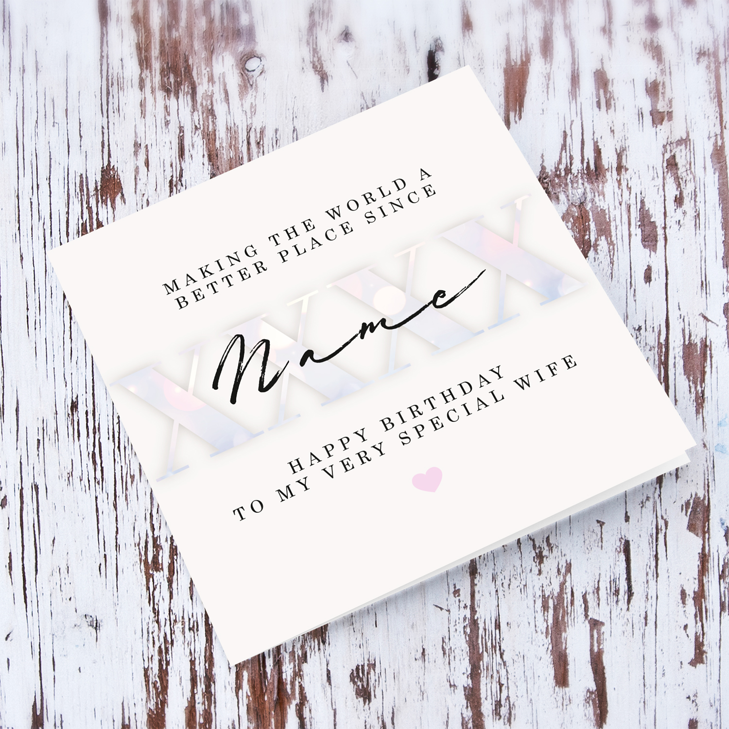 Light coloured birthday card for Wife, with personalisable year of birth and name, in light pink colours - Making the world a better place in English