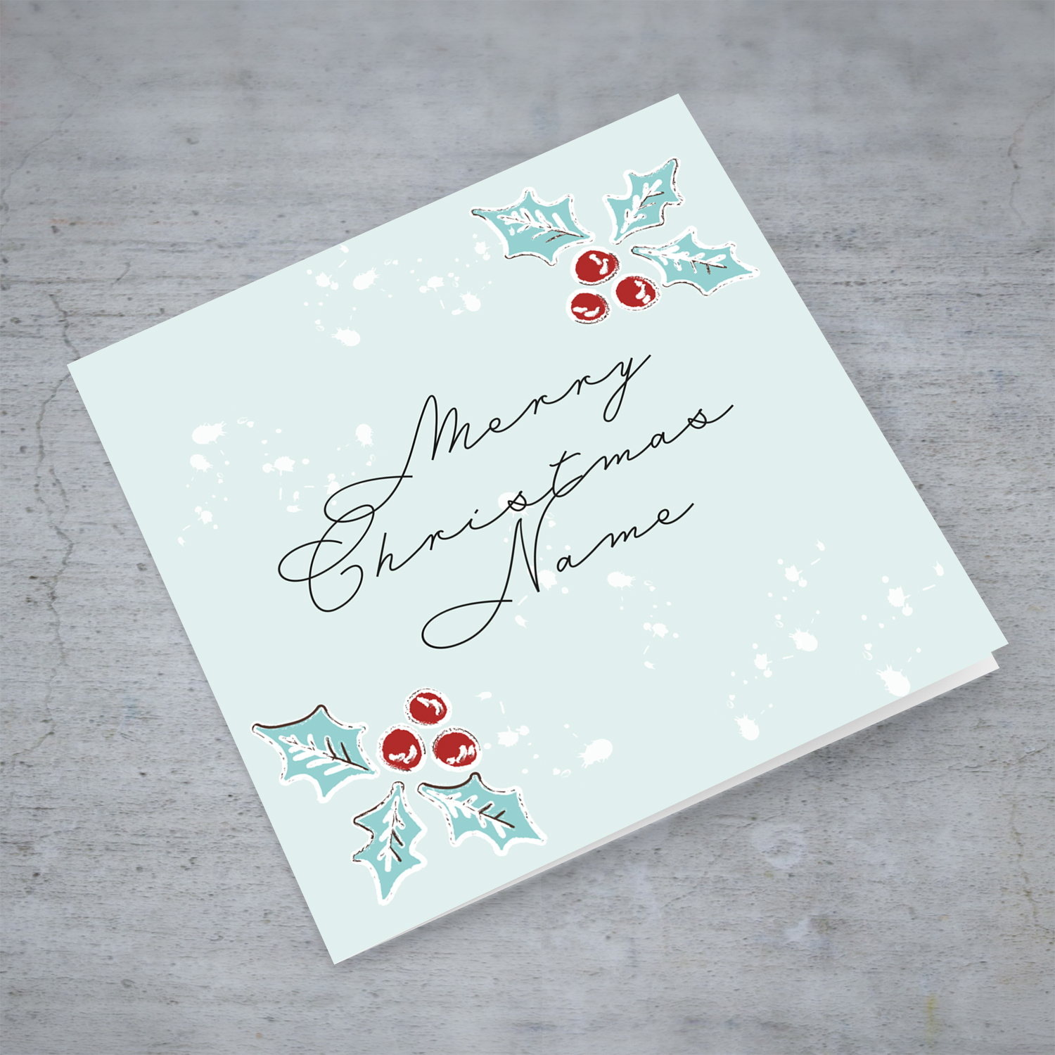 Christmas holly, scattered snow, and light background personalisable Christmas card in English