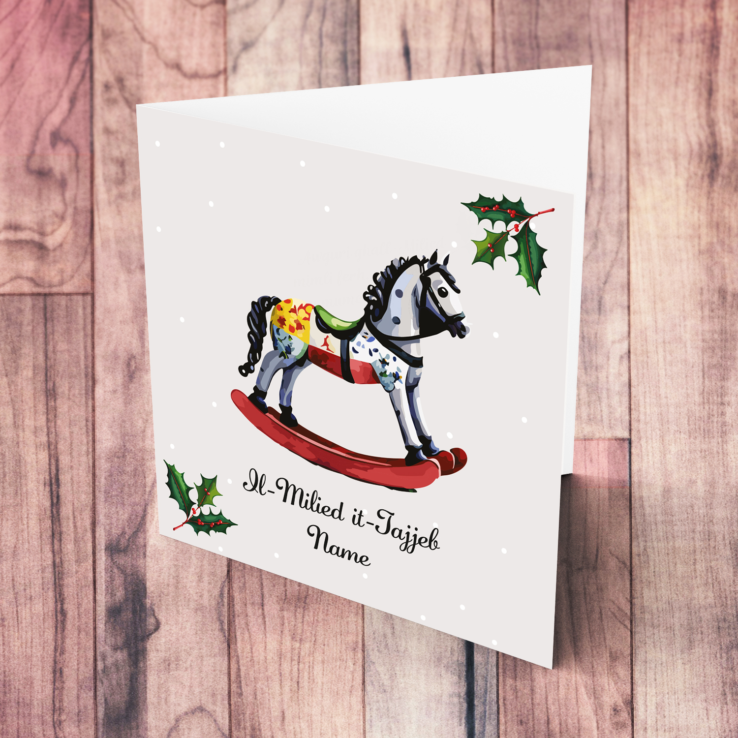 Cute rocking horse themed Christmas card with hollies in Maltese (Personalisable)