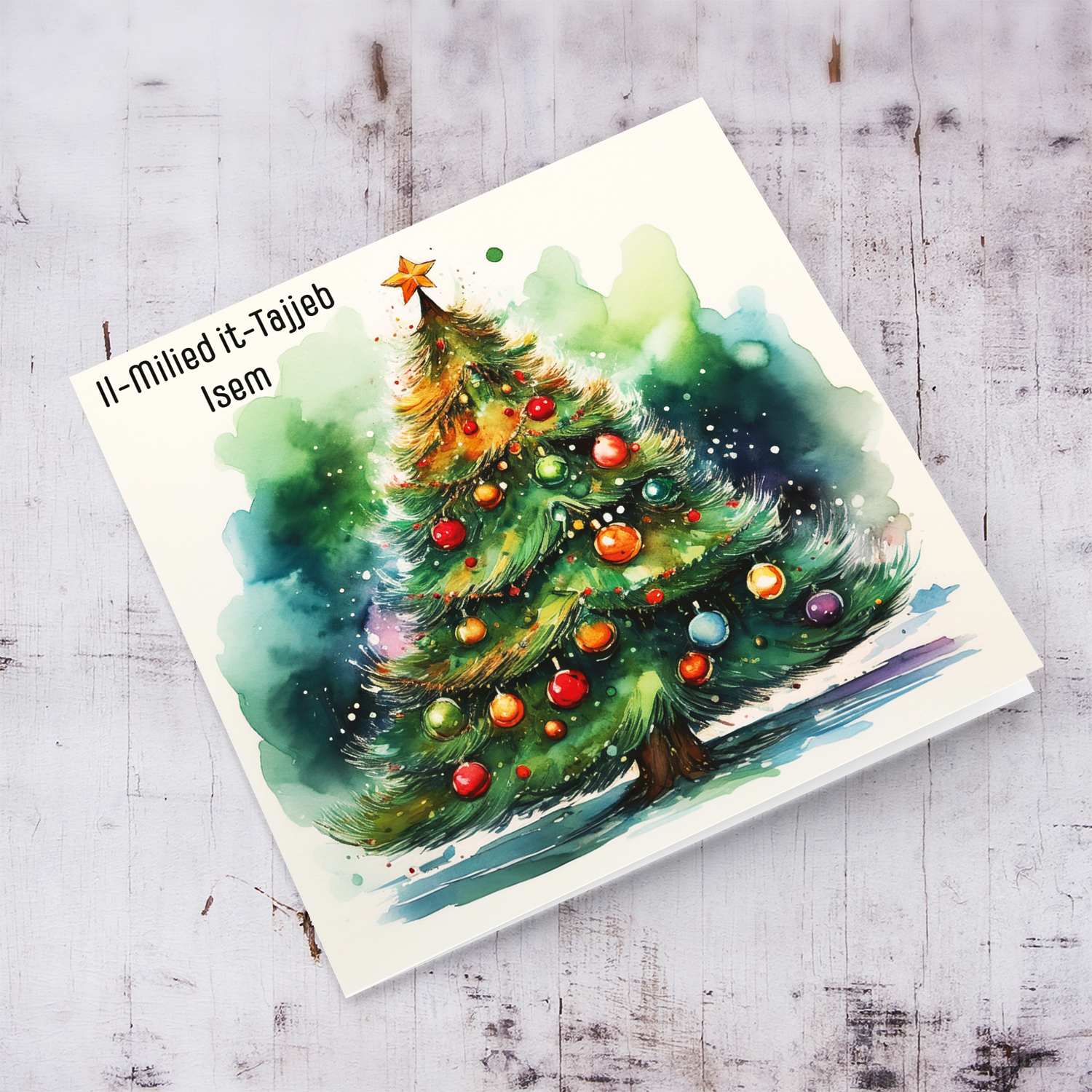 A beautiful Christmas card featuring a decorated Xmas tree in watercolours in Maltese (Personalisable)