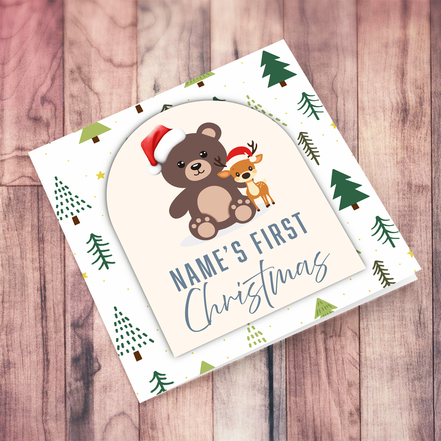 Baby's First Christmas, featuring a christmas tree background, with cute tedd bear and reindeer wearing santa's hats in English (Personalisable)