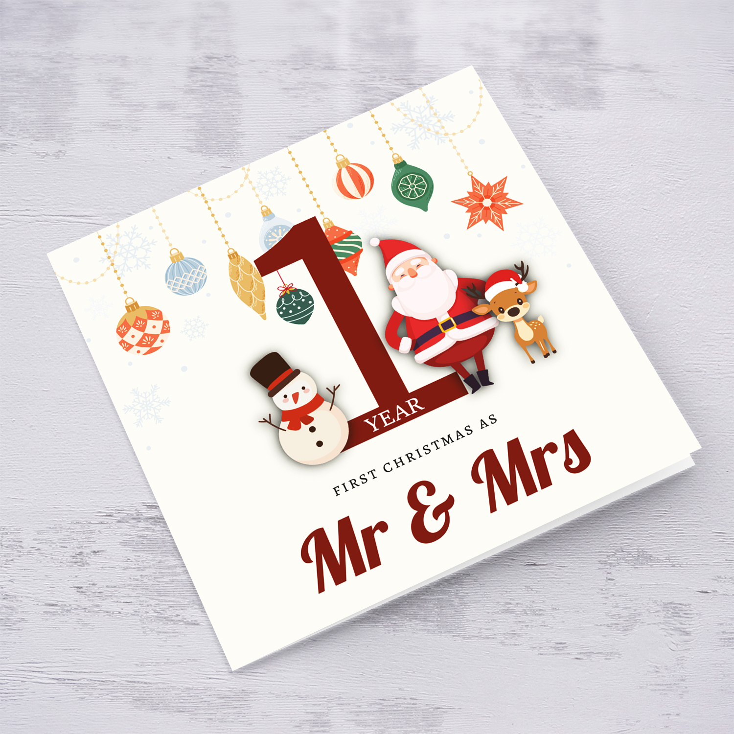 A special 1st Christmas card, featuring hanging baubles with a cute snowman, santa, and reindeer for First Christmas as Mr & Mrs in English (Personalisable - to enter YEAR)