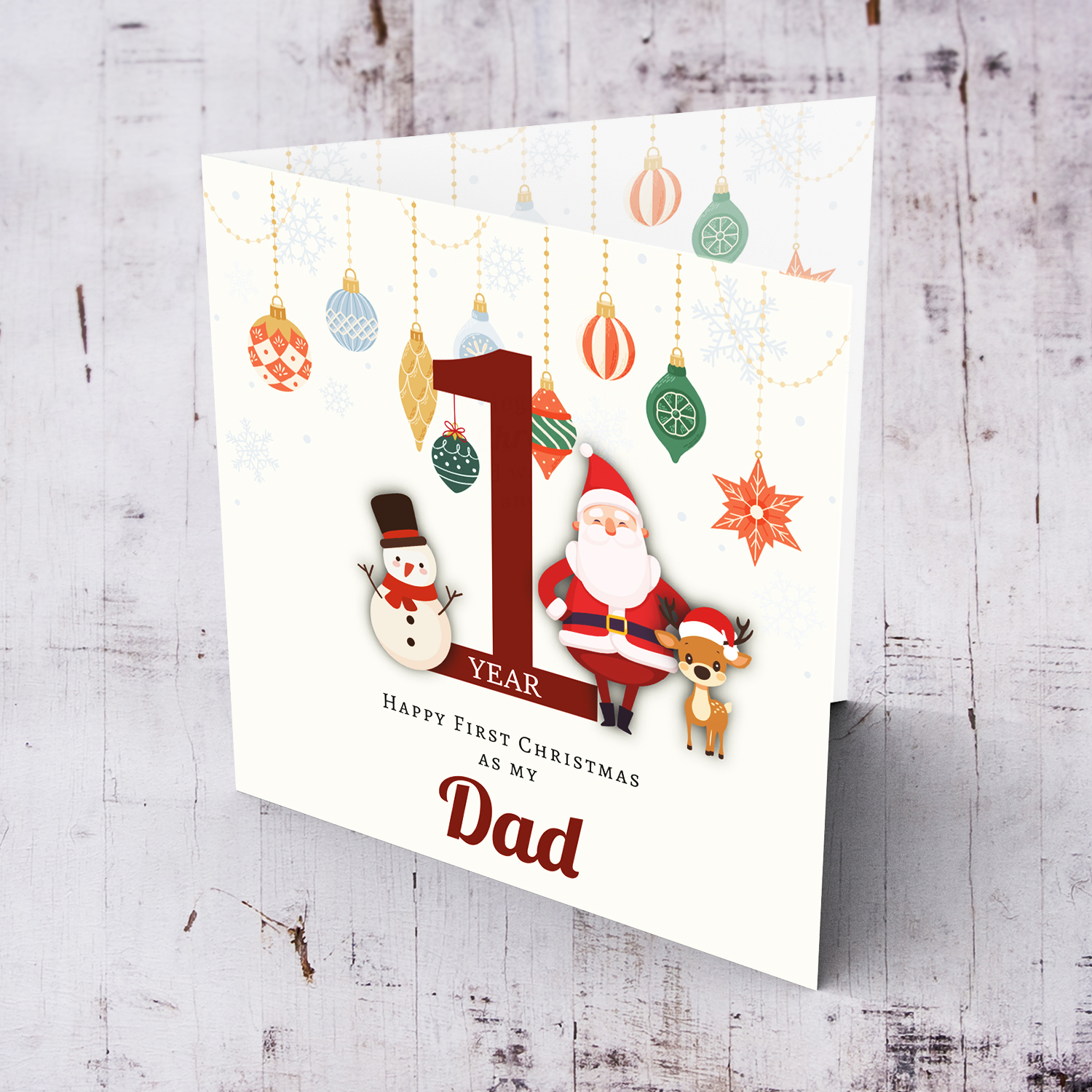 A special First Christmas card, featuring hanging baubles with a cute snowman, santa, and reindeer for Dad in English