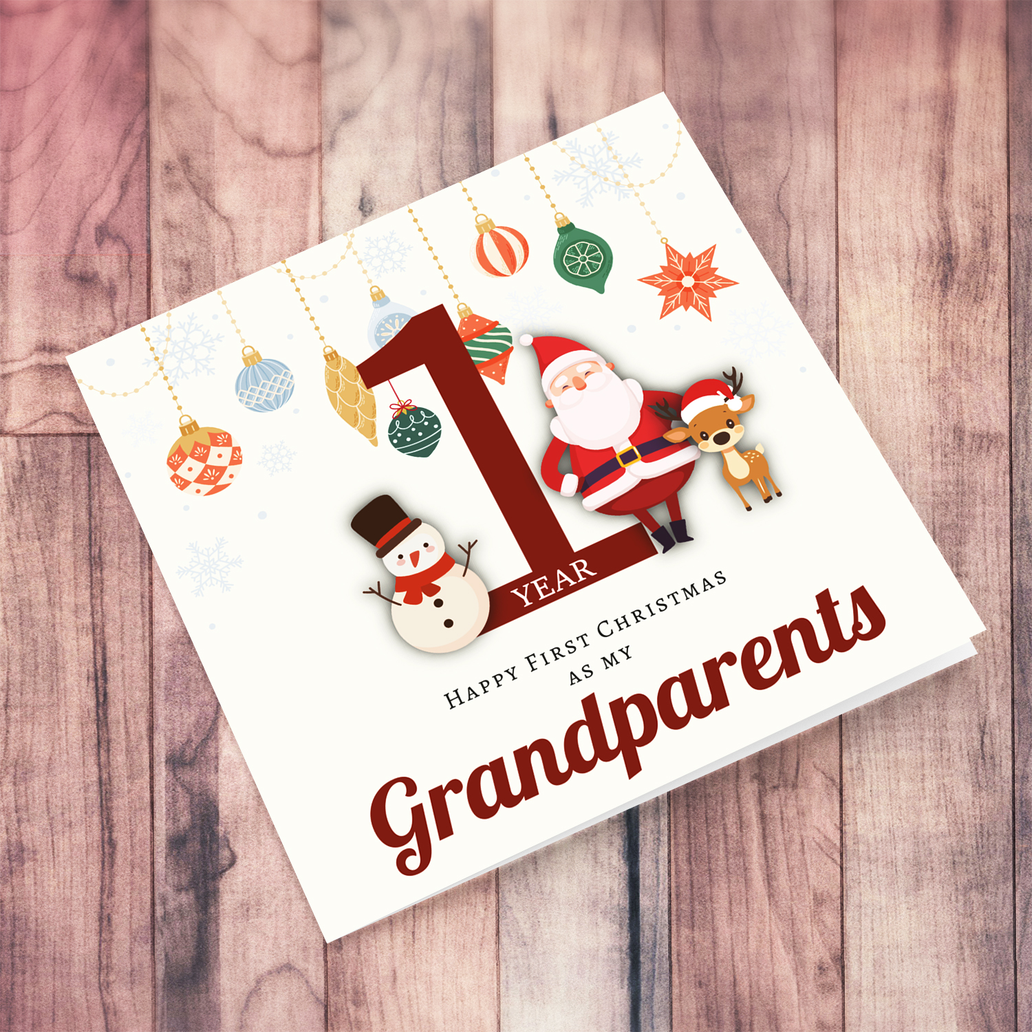 A special First Christmas card, featuring hanging baubles with a cute snowman, santa, and reindeer for Grandparents in English