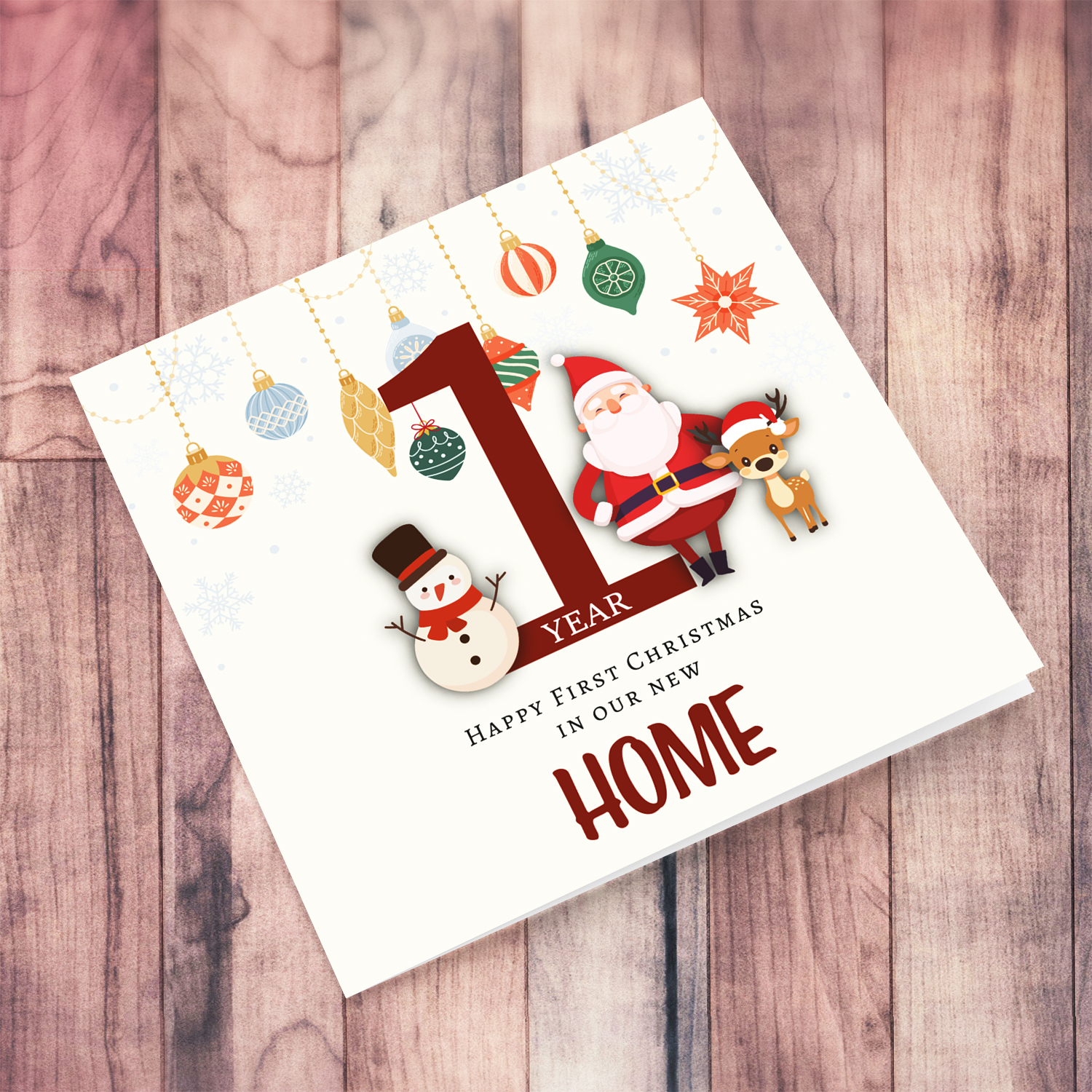 A special First Christmas in our new Home, featuring hanging baubles with a cute snowman, santa, and reindeer in English