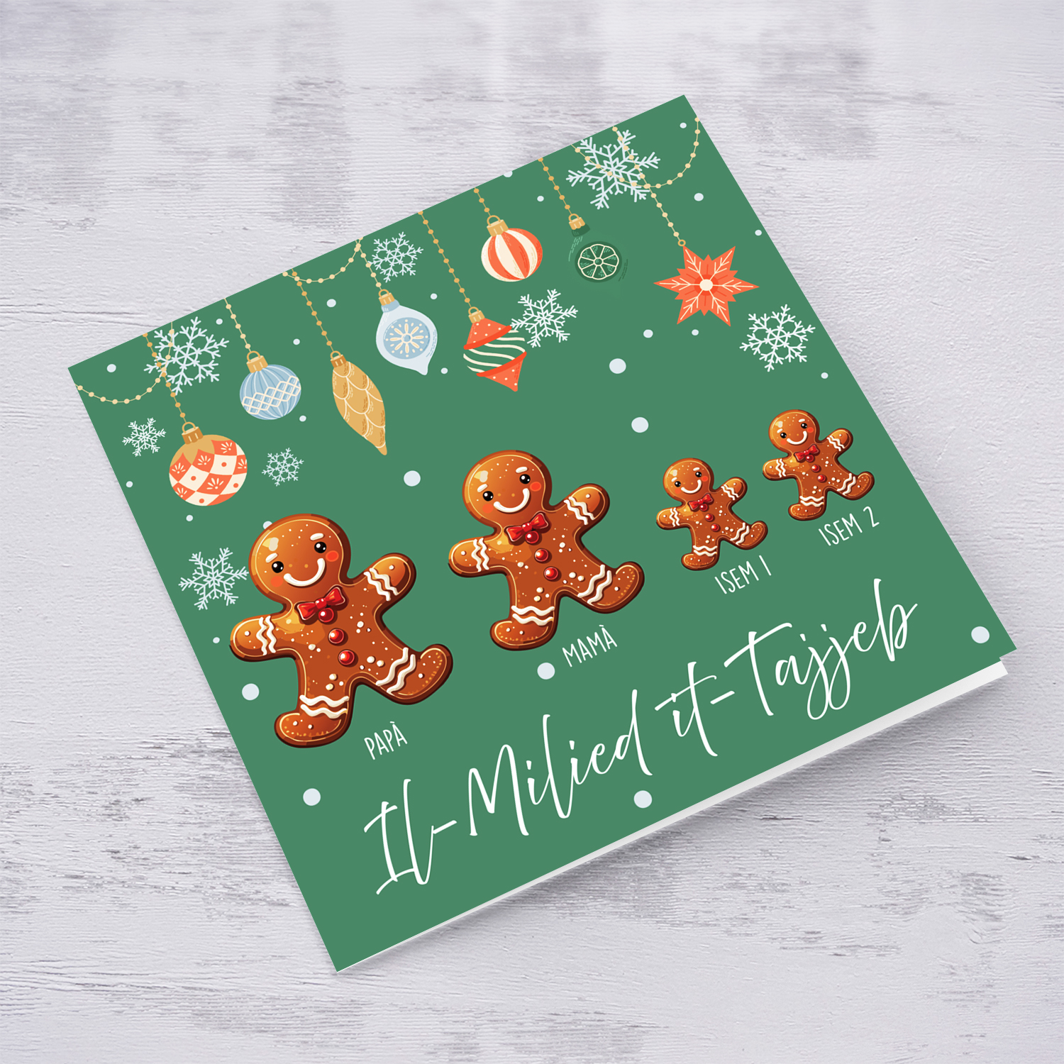 A cute Christmas card, featuring a family of ginger breadman with 2 children, green background & hanging baubles in Maltese (Personalisable, Neutral & Unisex)