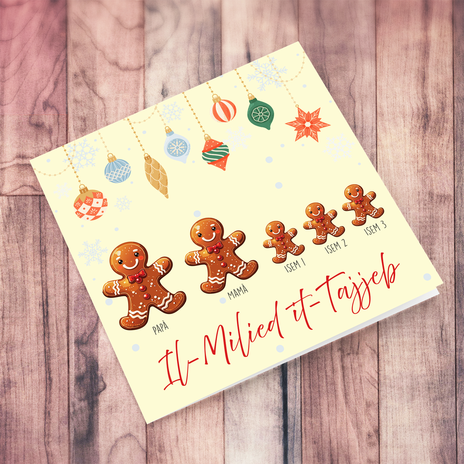 A cute Christmas card, featuring a family of ginger breadman with 3 children, hanging baubles in Maltese (Personalisable)