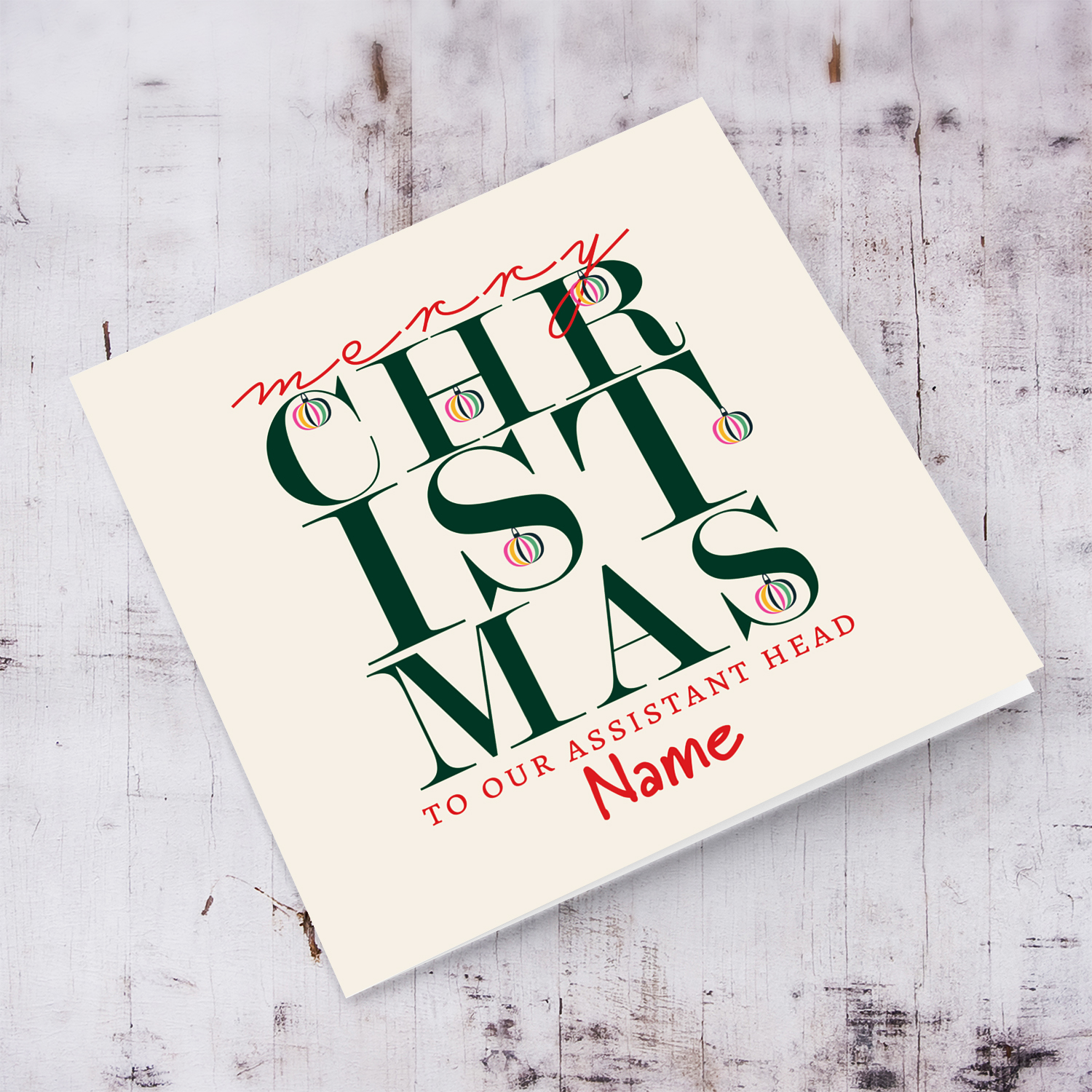 A beautiful, modern Christmas card, in the holiday's  season colours with various hanging baubles for Assistant Head of School in English (Unisex and Neutral)