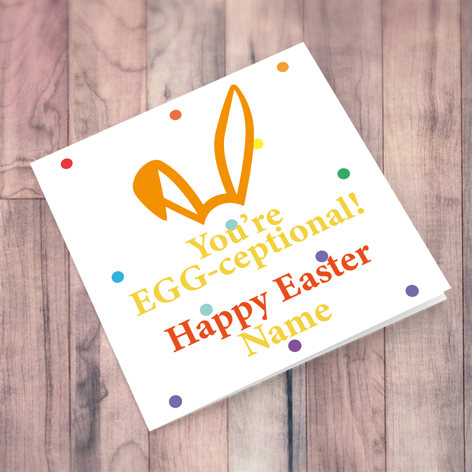 Colourful bunny ears personalisable Easter card with colourful dots in the background in English