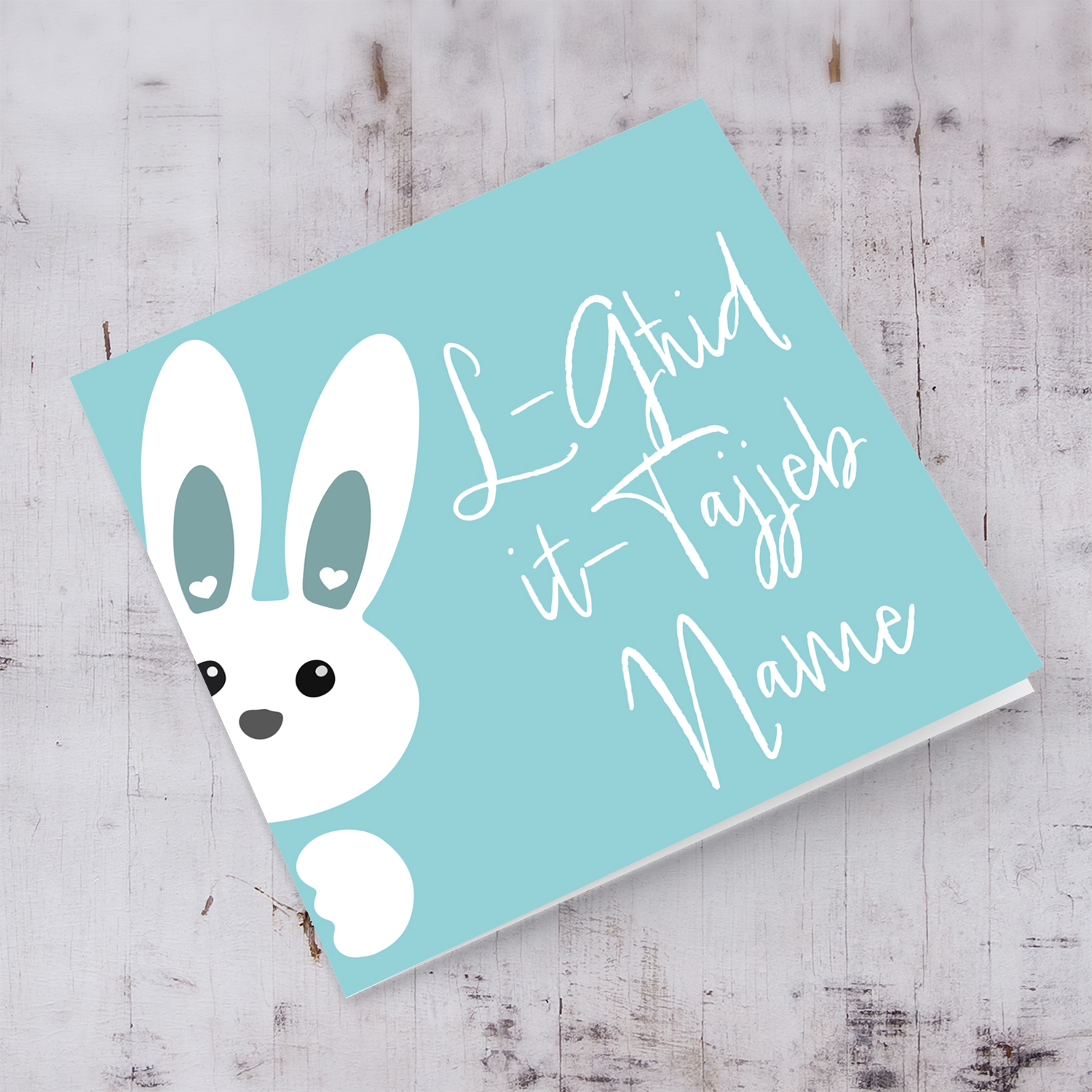 Cute bunny peeping out with blue background personalisable Easter Card in Maltese 