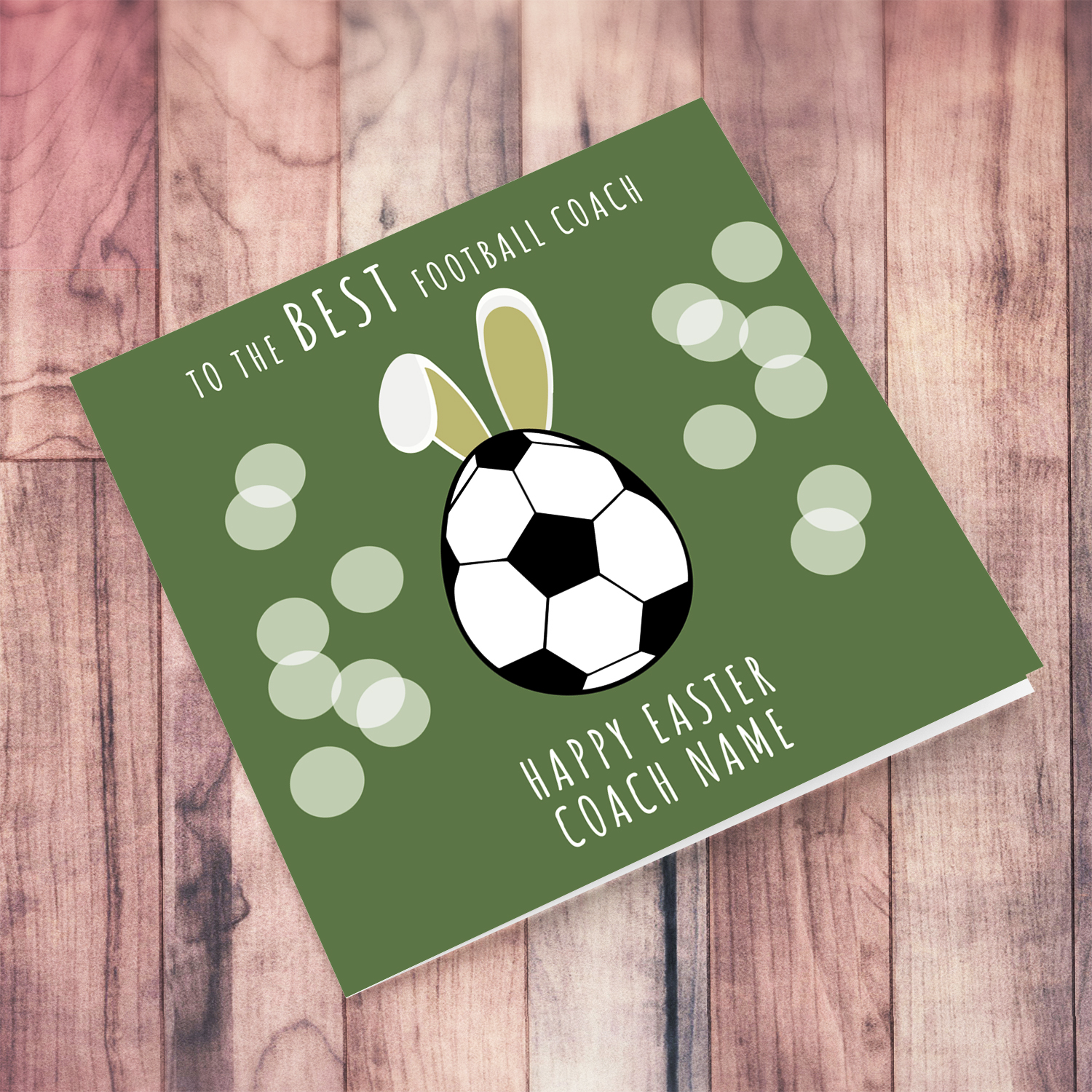 A colourful Easter Card with a green background for the BEST football coach, with ball shaped as Easter Egg in English (Personalisable)