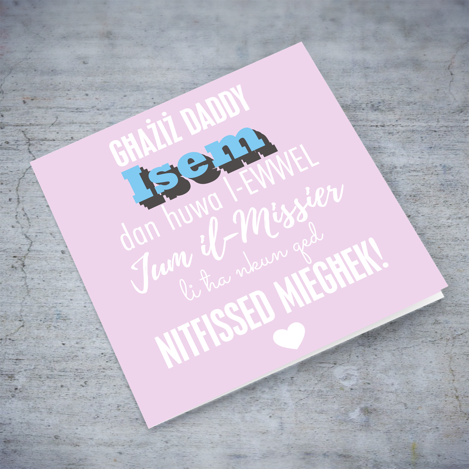 First father's day as a daddy personalisable card with pink background and blue and white text in Maltese