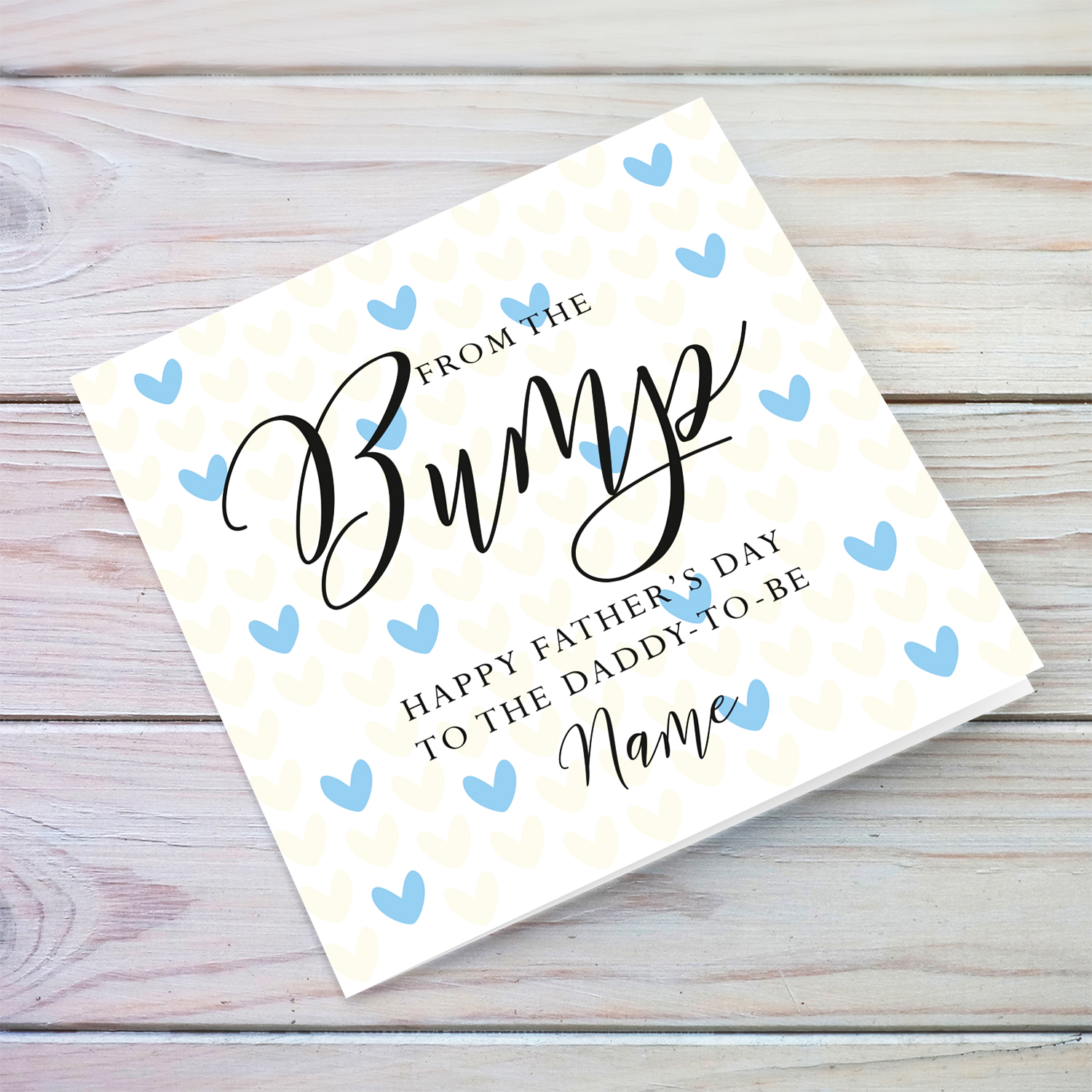 A cute father's day card for the daddy to be from the bump, in a two toned heart themed background in English (Personalisable)