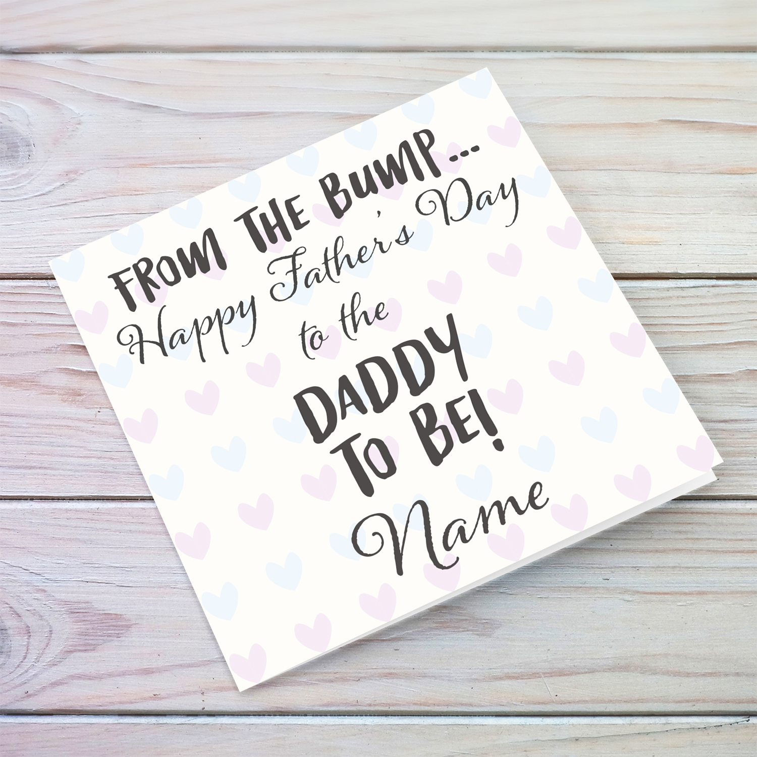 Father's day personalisable card for daddy to be from the bump with pink and blue hearts in English