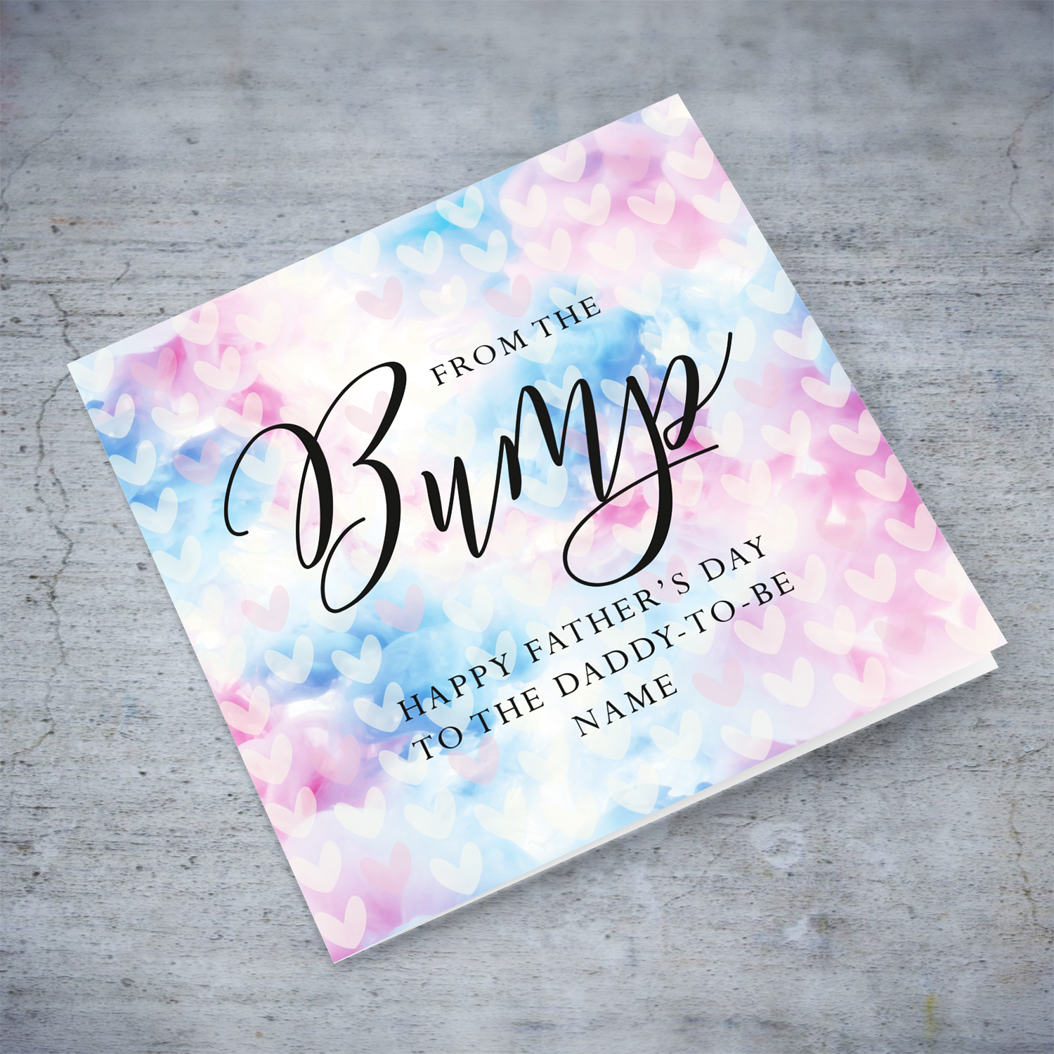 A cute father's day card for the daddy to be from the bump, featuring a colourful two toned background with scattered hearts in English (Personalisable) 