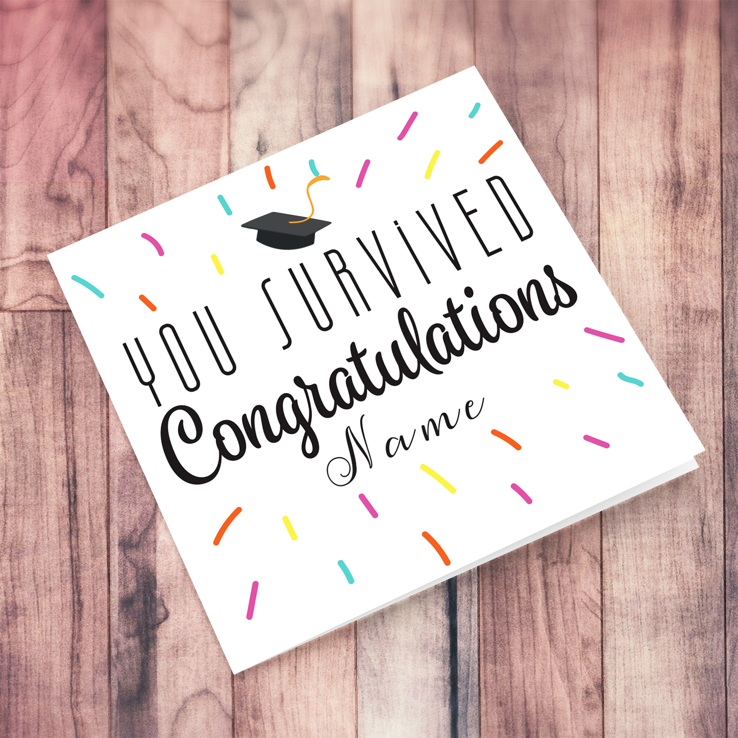 Colourful & funny graduation card - You Survived congratulations in English with pinkish confetti (Personalisable)