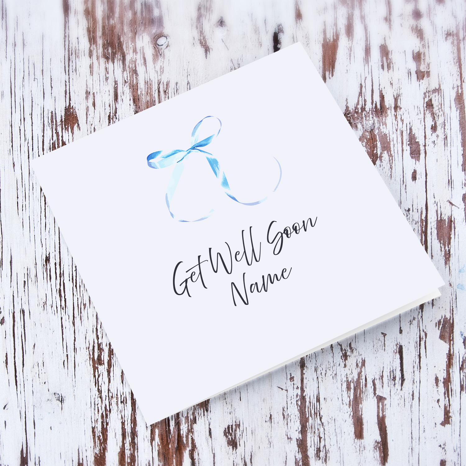 Minimalist get well soon card with cute blue bow and light blue background in English (Personalisable)