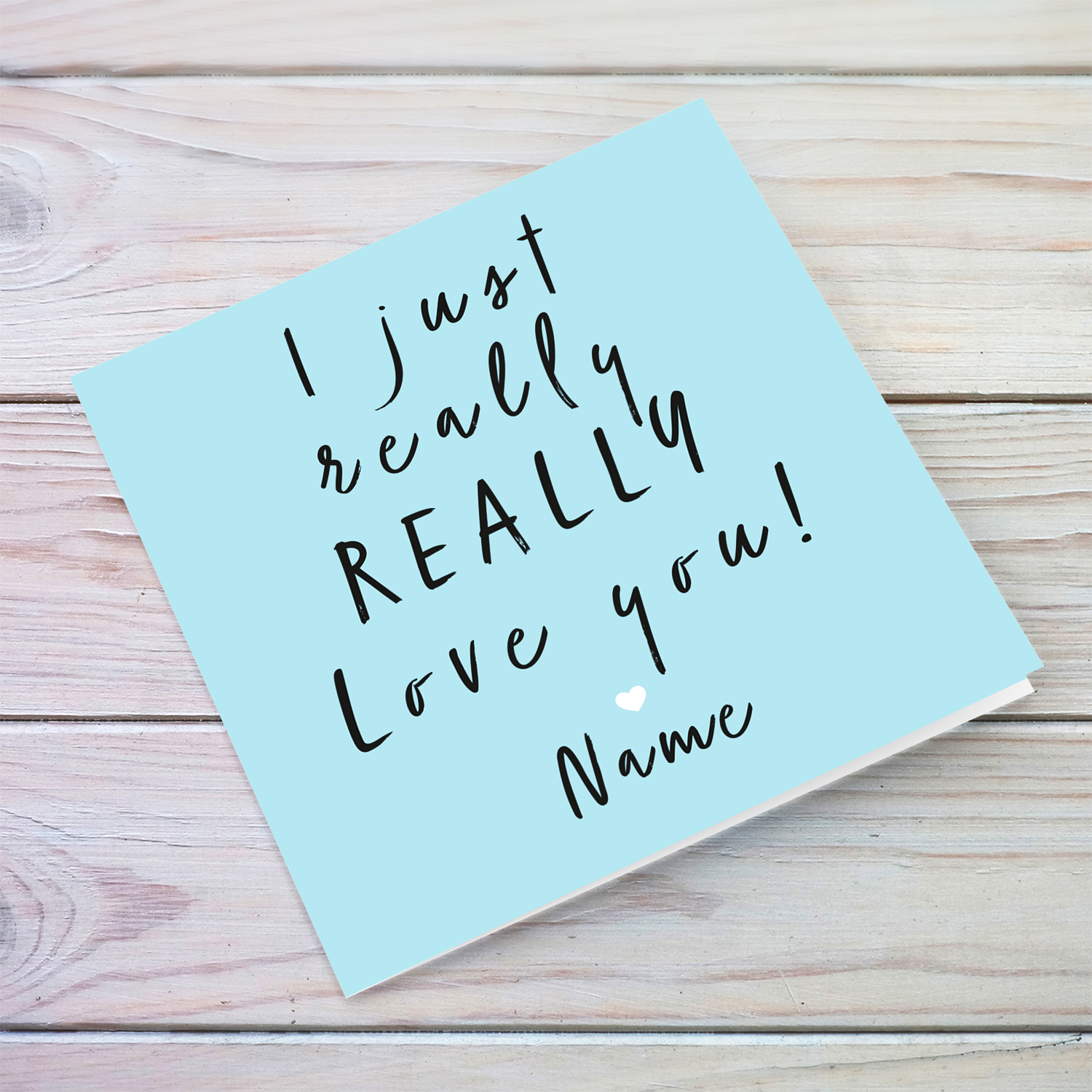Blue background with black text personalisable Anniversary card in English