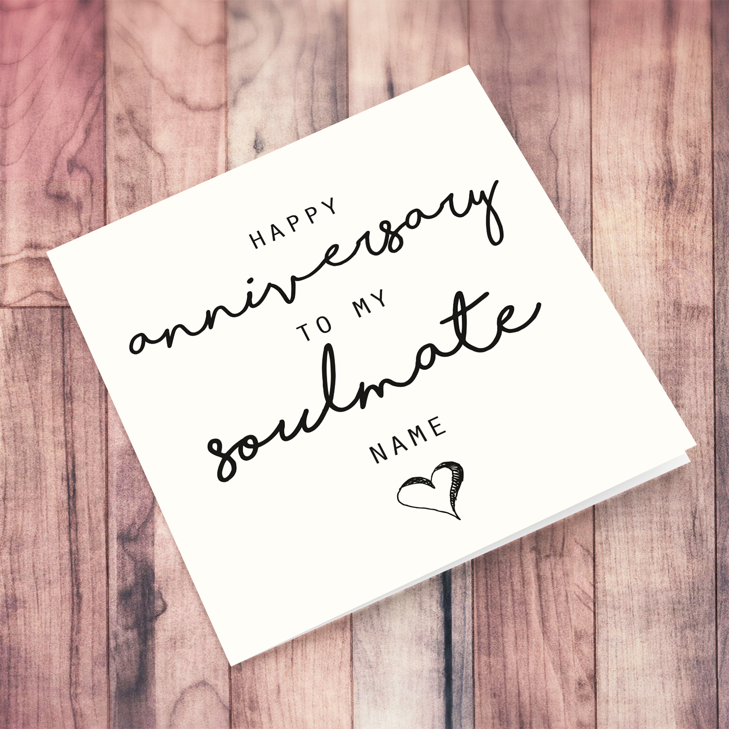 A minimalist anniversary card - to my soulmate featuring a black heart in English  (Personalisable)