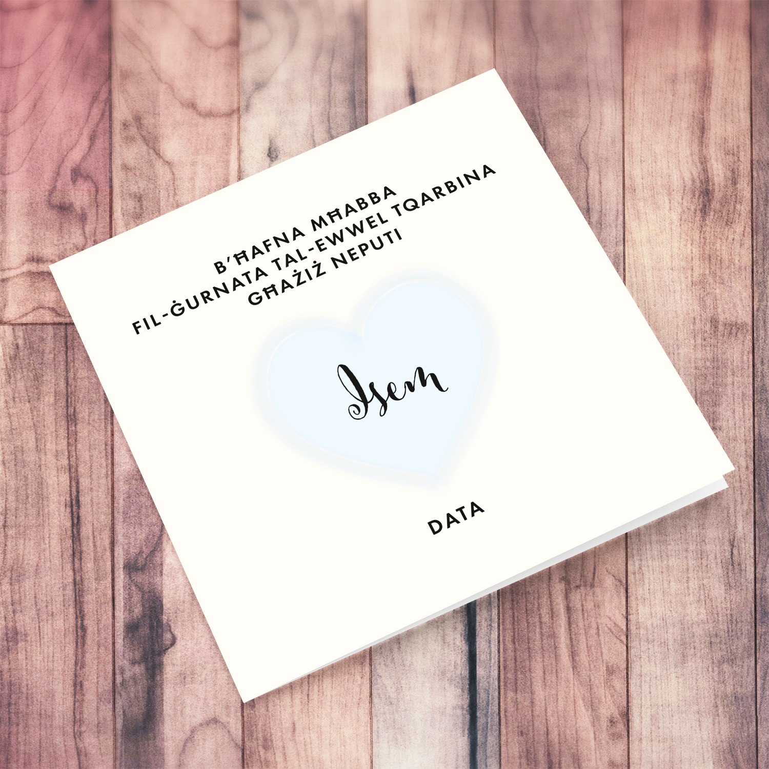A minimalist Holy Communion card for Nephew featuring a light blue heart in Maltese (Personalisable)