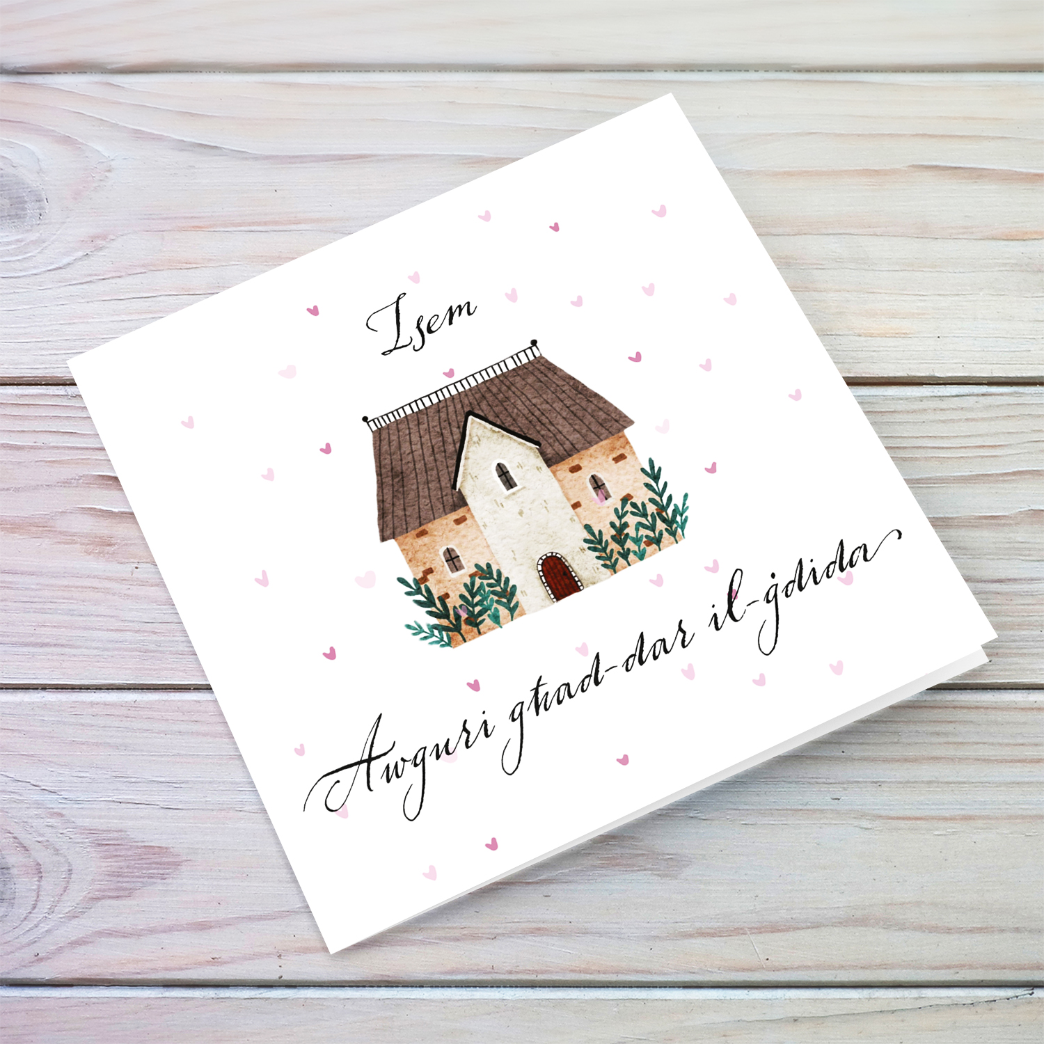 New home greeting card with scattered pink hearts and home illustration in Maltese (Personalisable)